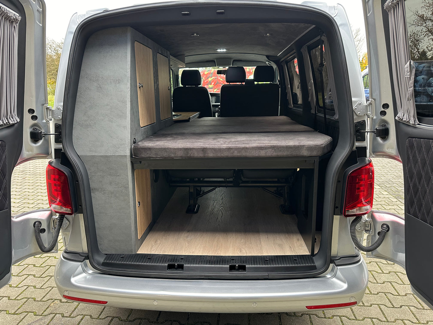 Volkswagen T6.1 Camper 2.0 TDI 110PS unfallfrei | Wohnmobil mit Navi, PDC, Rückfahrkamera | Campervan Umbau 5 Sitzer Leder