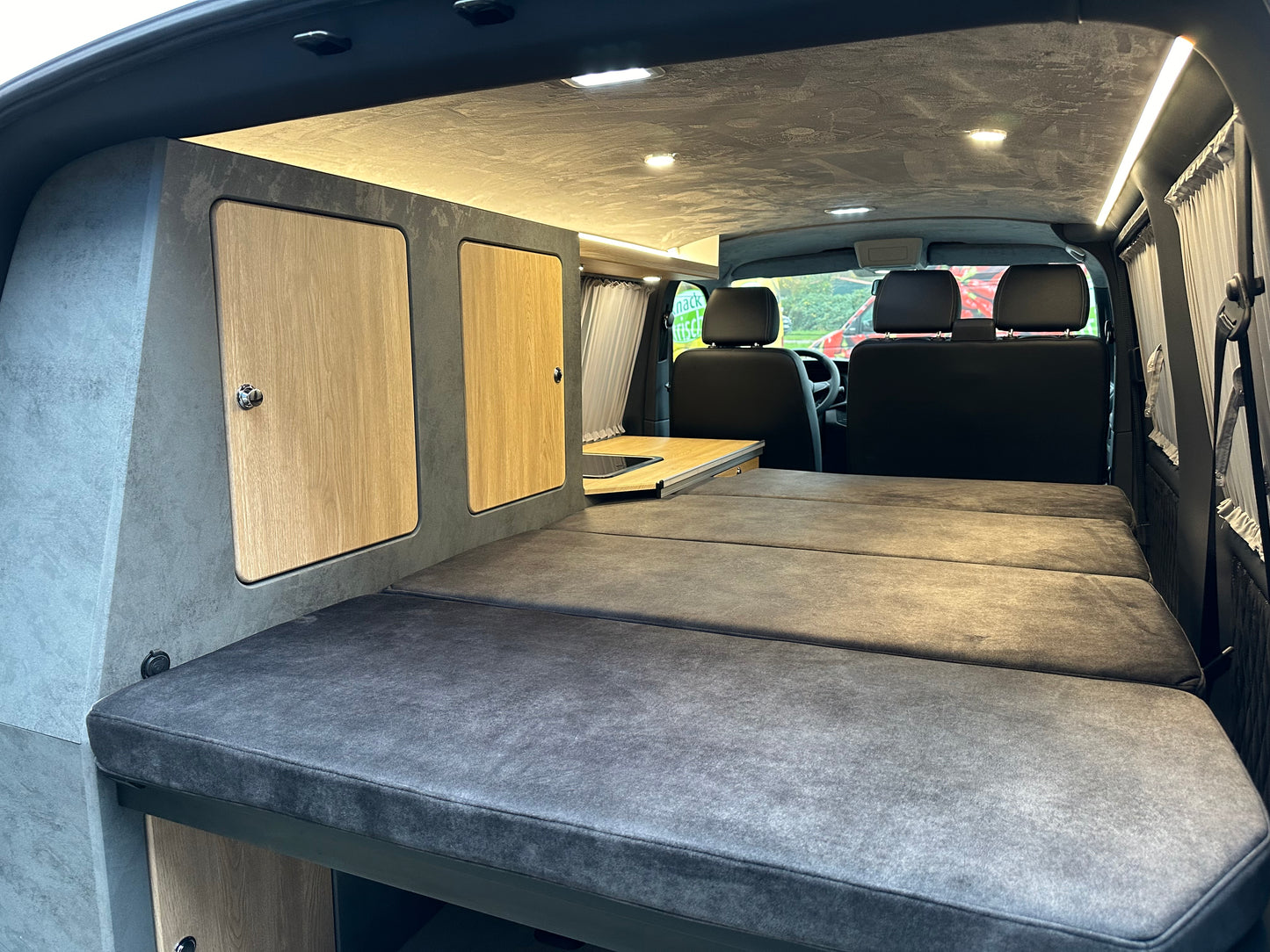 Volkswagen T6.1 Camper 2.0 TDI 110PS unfallfrei | Wohnmobil mit Navi, PDC, Rückfahrkamera | Campervan Umbau 5 Sitzer Leder