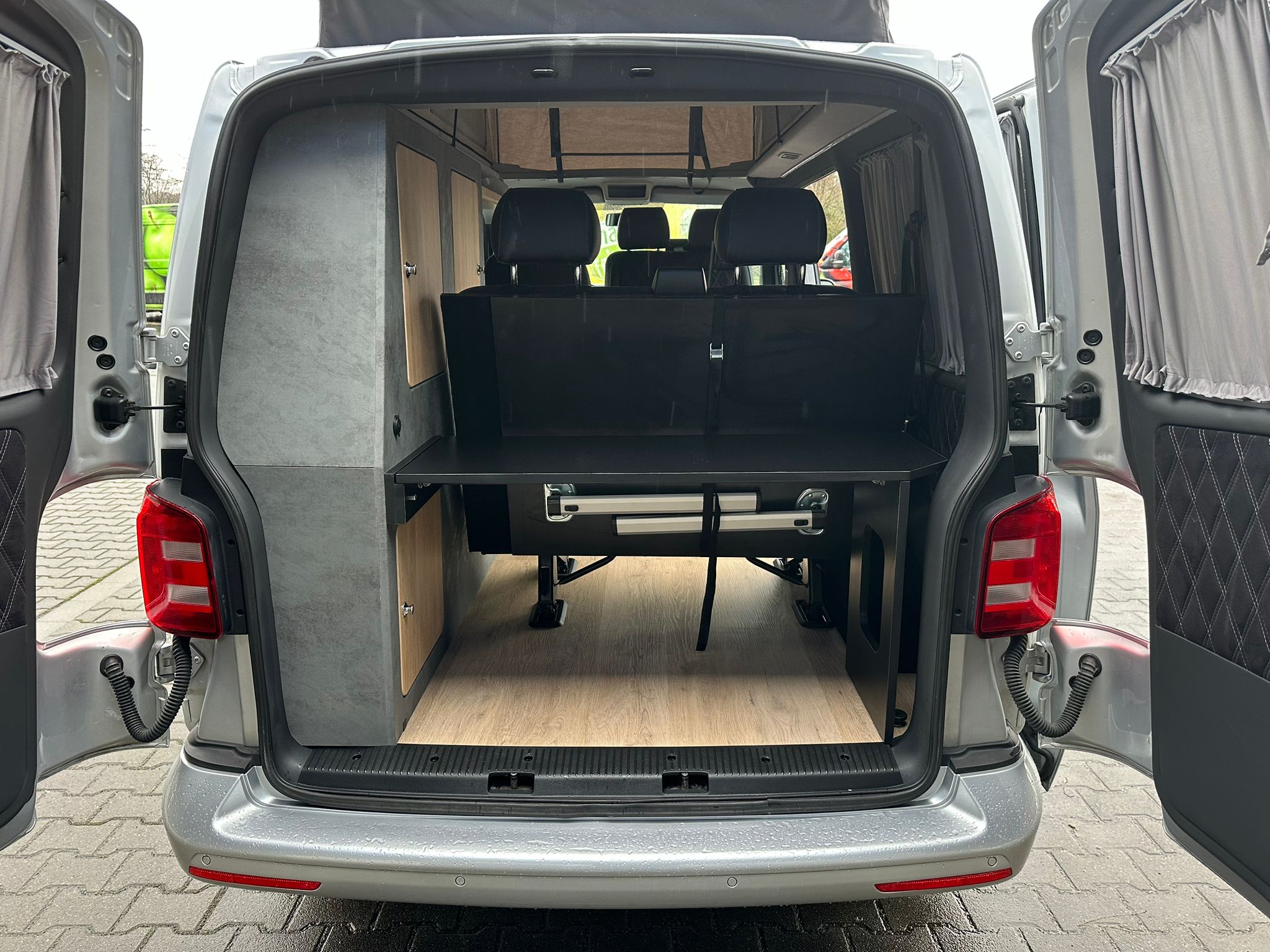 Volkswagen T6 Camper 2.0 TDI 102PS unfallfrei | Wohnmobil mit Hubdach Schlafdach, PDC, Navi, Rückfahrkamera | Campervan Umbau 5 Sitzer