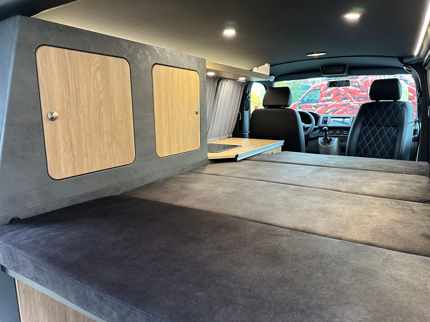 Volkswagen T6 Camper 2.0 TDI 102PS unfallfrei | Wohnmobil mit PDC, Navi, Rückfahrkamera | Campervan Umbau 4 Sitzer Leder