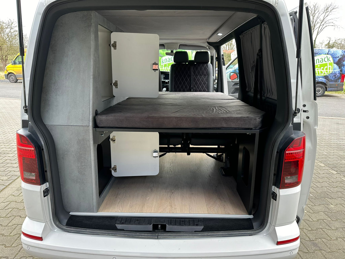 Volkswagen T6.1 Camper 2.0 TDI 150PS unfallfrei | Wohnmobil mit Hubdach Schlafdach, PDC, Navi, Rückfahrkamera | Campervan Umbau 5 Sitzer