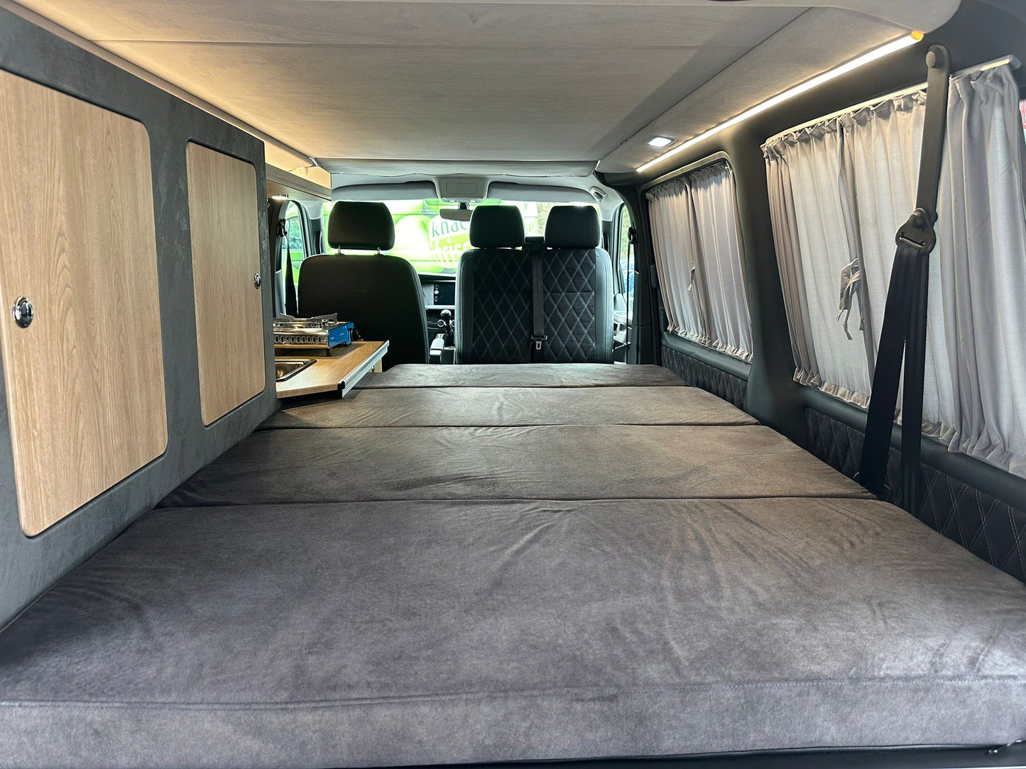 Volkswagen T6.1 Camper 2.0 TDI 150PS unfallfrei | Wohnmobil mit Hubdach Schlafdach, PDC, Navi, Rückfahrkamera | Campervan Umbau 5 Sitzer