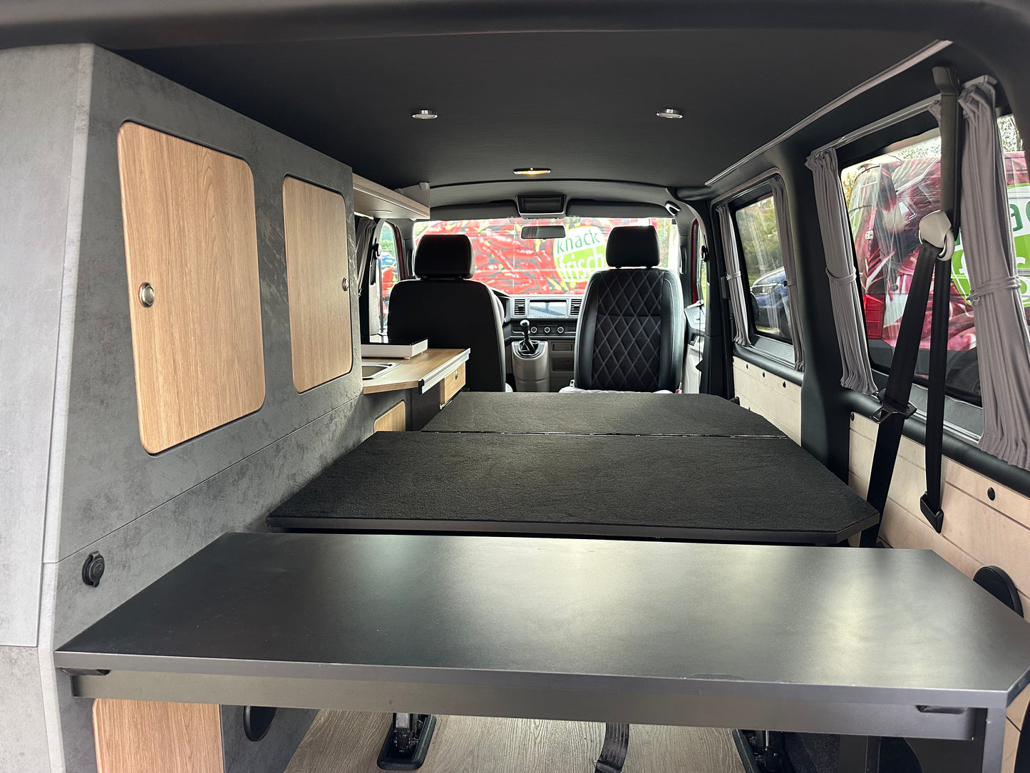 Volkswagen T6 Camper 2.0 TDI 102PS unfallfrei | Wohnmobil mit PDC, Navi, Rückfahrkamera | Campervan Umbau 4 Sitzer Leder