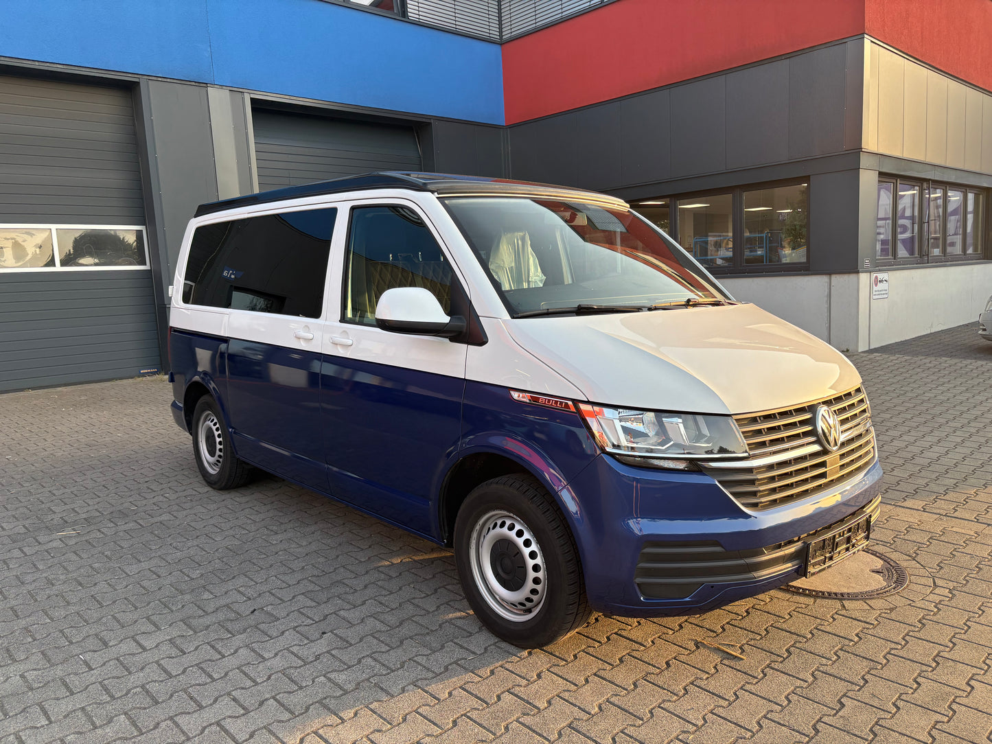Volkswagen T6.1 Camper 2.0 TDI 150PS unfallfrei | Wohnmobil mit Hubdach Schlafdach, PDC, Navi, Rückfahrkamera | Campervan Umbau 5 Sitzer VW