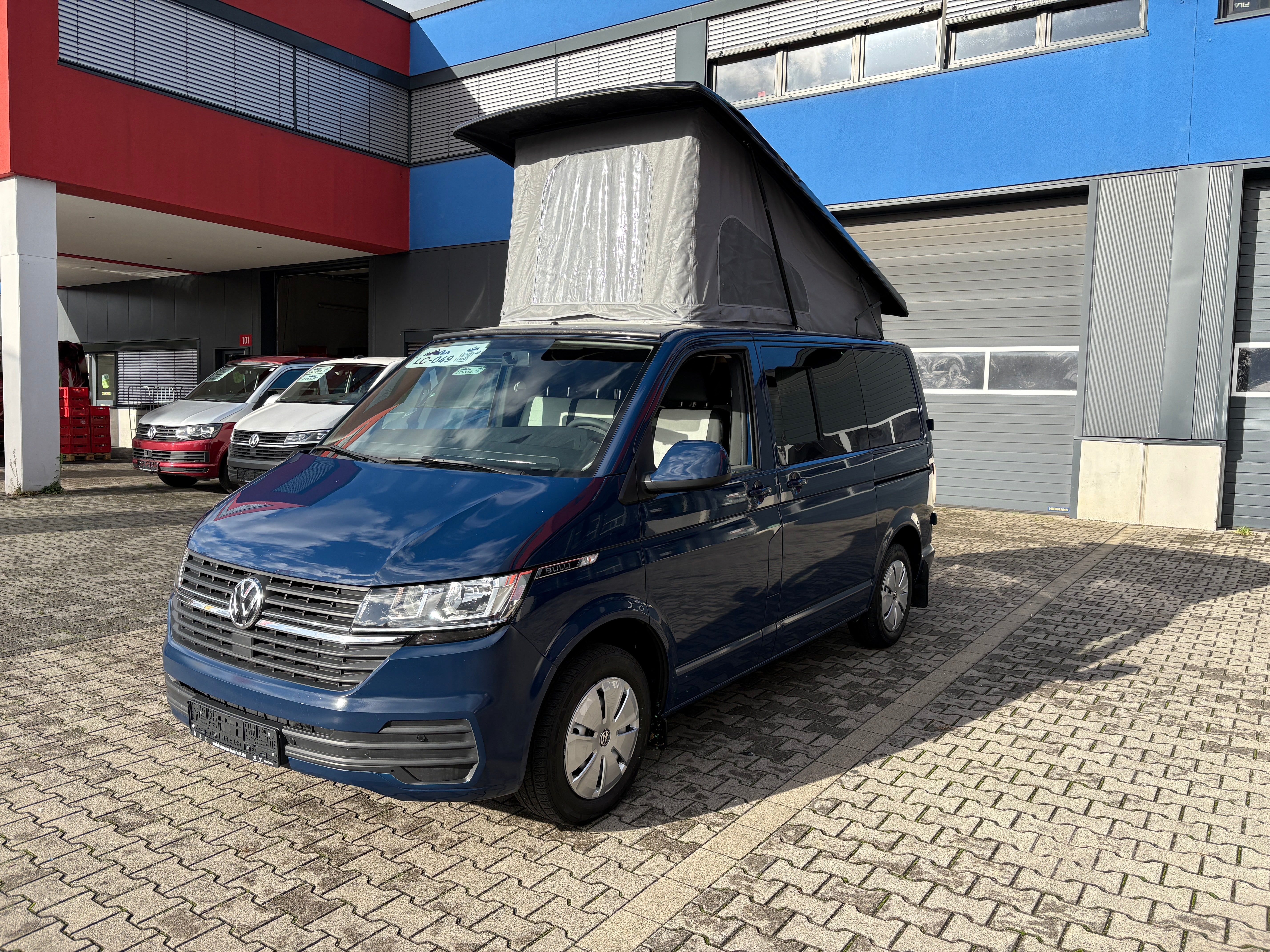 Volkswagen T6.1 Camper 2.0 TDI 110PS unfallfrei | Wohnmobil mit Hubdach Schlafdach, PDC, Navi, Rückfahrkamera | Campervan Umbau 5 Sitzer
