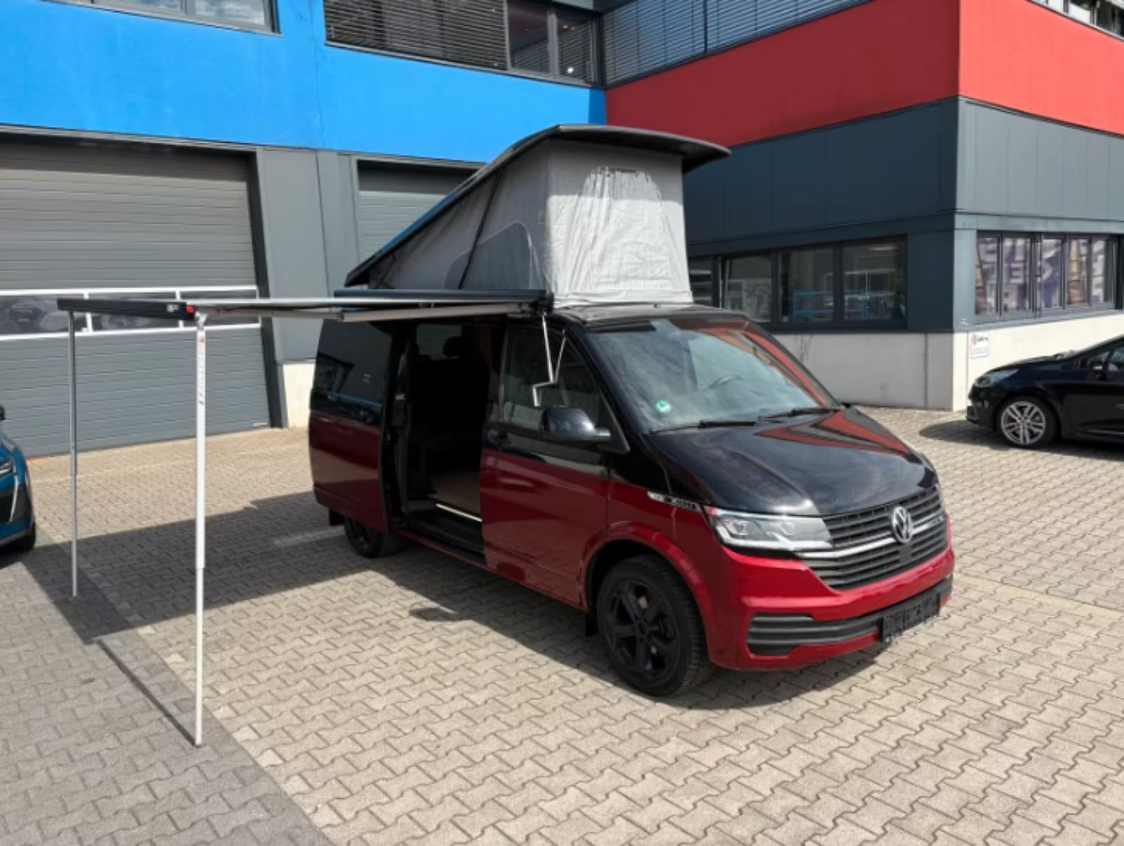 Volkswagen T6.1 Camper 2.0 TDI DSG 150PS unfallfrei | Wohnmobil mit Hubdach Schlafdach, PDC, Navi, Rückfahrkamera | Campervan Umbau 5 Sitzer VW