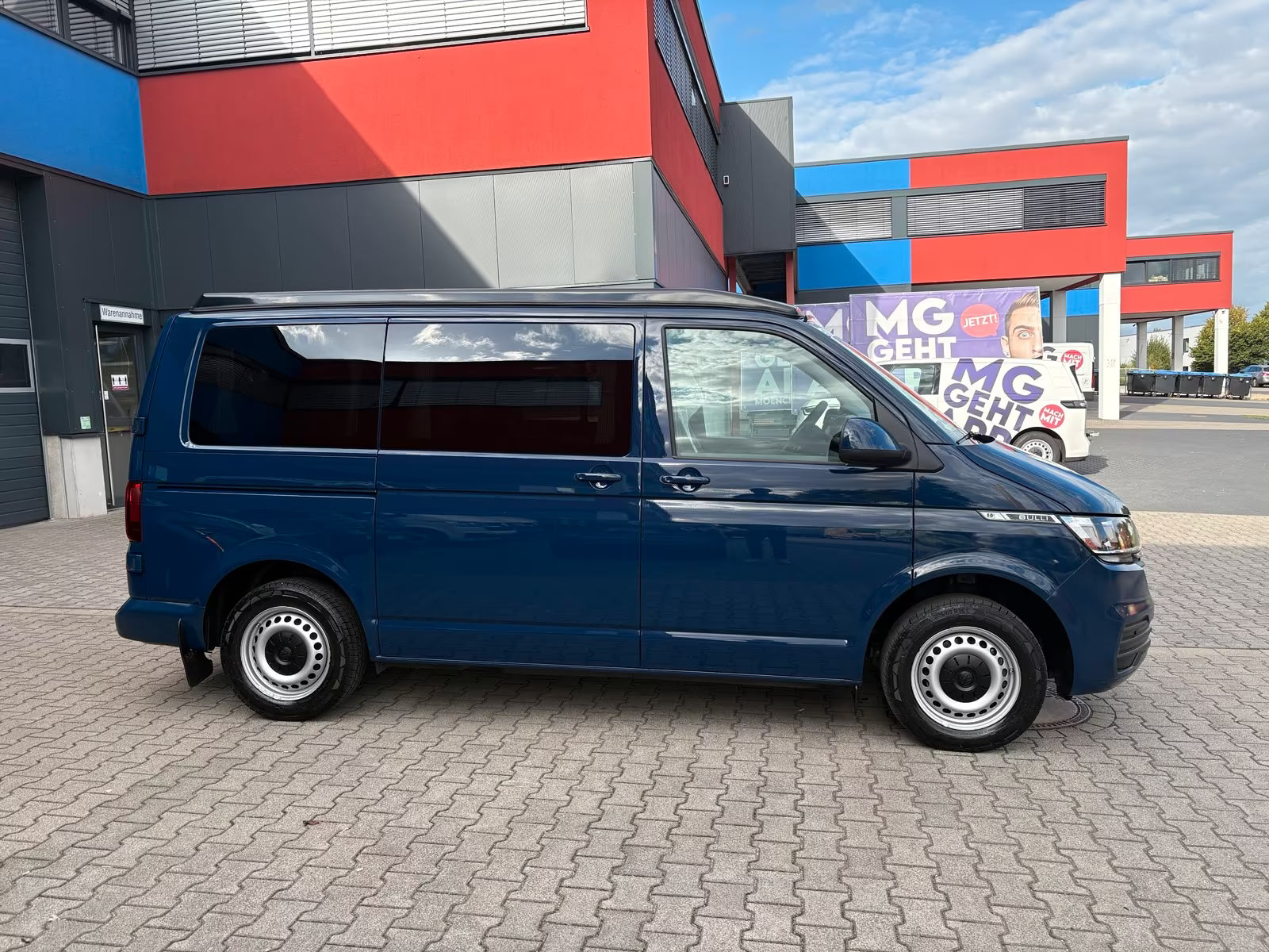 Volkswagen T6.1 Camper 2.0 TDI 110PS unfallfrei | Wohnmobil mit Hubdach Schlafdach, PDC, Navi, Rückfahrkamera | Campervan Umbau 5 Sitzer