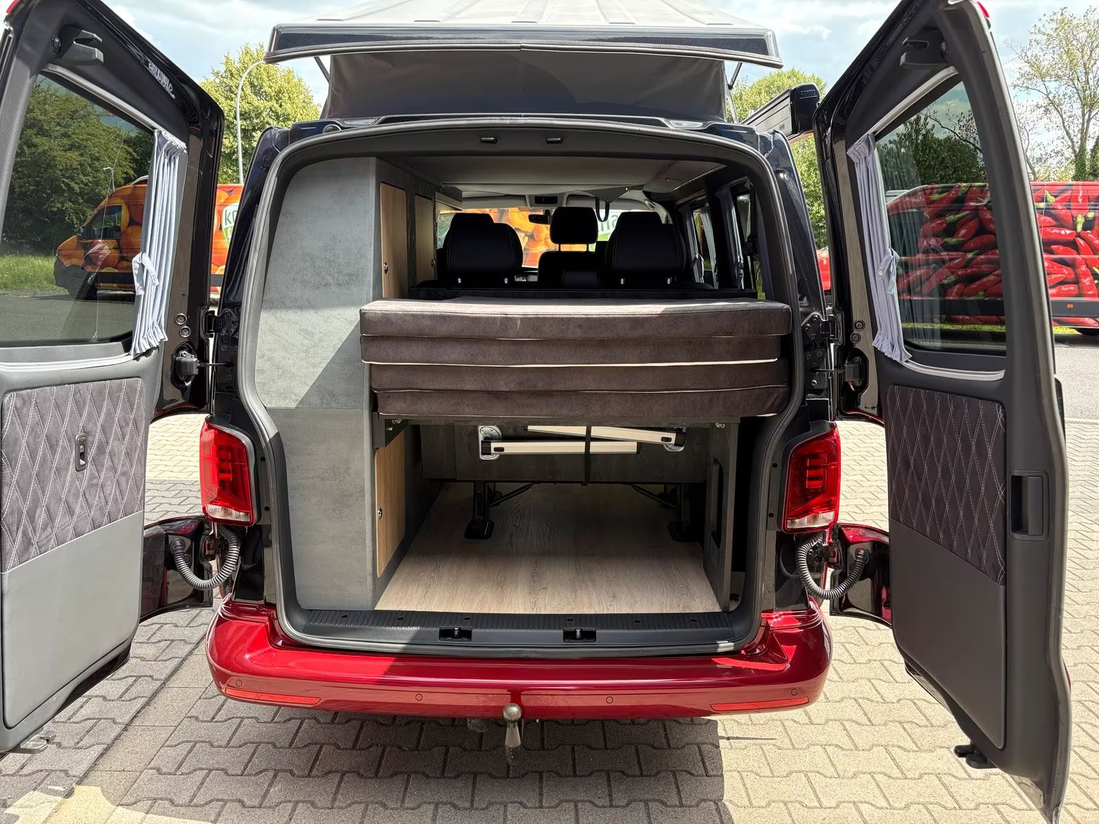 Volkswagen T6.1 Camper 2.0 TDI DSG 150PS unfallfrei | Wohnmobil mit Hubdach Schlafdach, PDC, Navi, Rückfahrkamera | Campervan Umbau 5 Sitzer VW