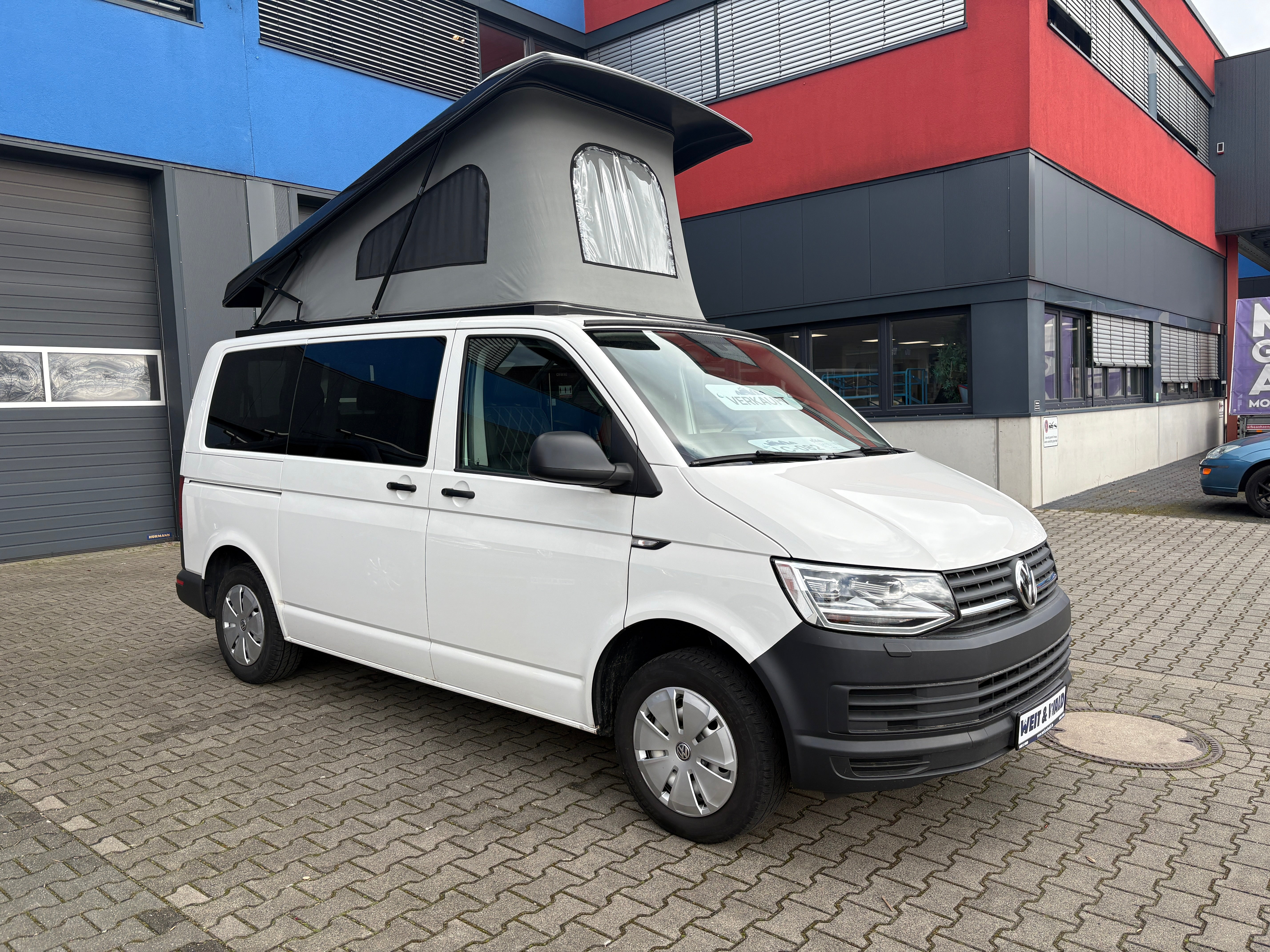Volkswagen T6 Camper mit Schlafdach 2.0 TDI, 150 PS, Weiß, Schalter - 6 Gang | VW Bulli Wohmobil Campervan | KM-Stand: 124.000 km, EZ: 11.2019, Foto 7 | Weit & Wald Mönchengladbach