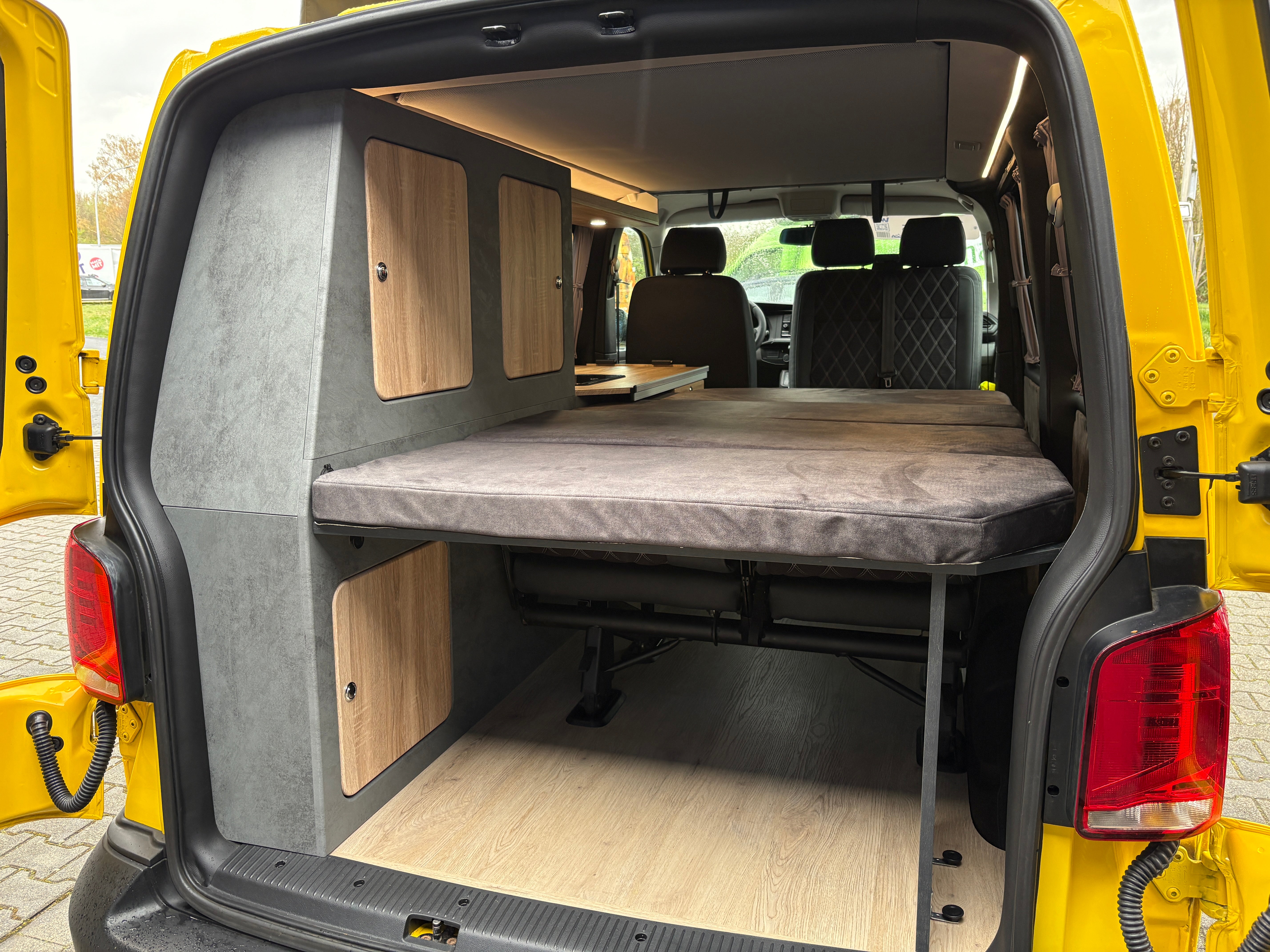 Volkswagen T6.1 Camper mit Schlafdach 2.0 TDI, 150 PS, Gelb, DSG | VW Bulli Wohmobil Campervan | KM-Stand: 81.000 km, EZ: 02.2020, Foto 17 | Weit & Wald Mönchengladbach