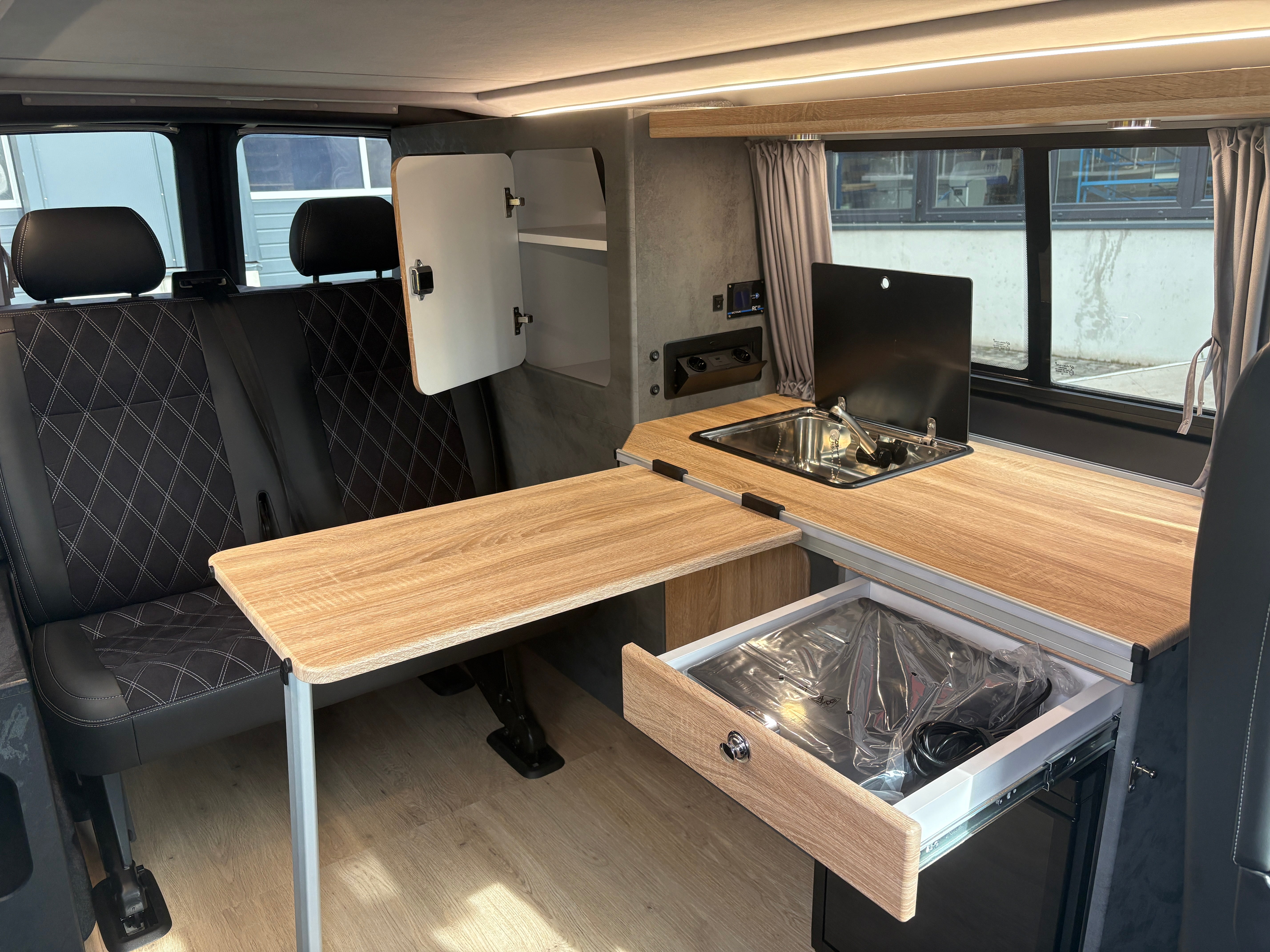 Volkswagen T6.1 Camper mit Schlafdach 2.0 TDI, 110 PS, Weiß | VW Bulli Wohmobil Campervan | KM-Stand: 80.000 km, EZ: 05.2021, Foto 17 | Weit & Wald Mönchengladbach