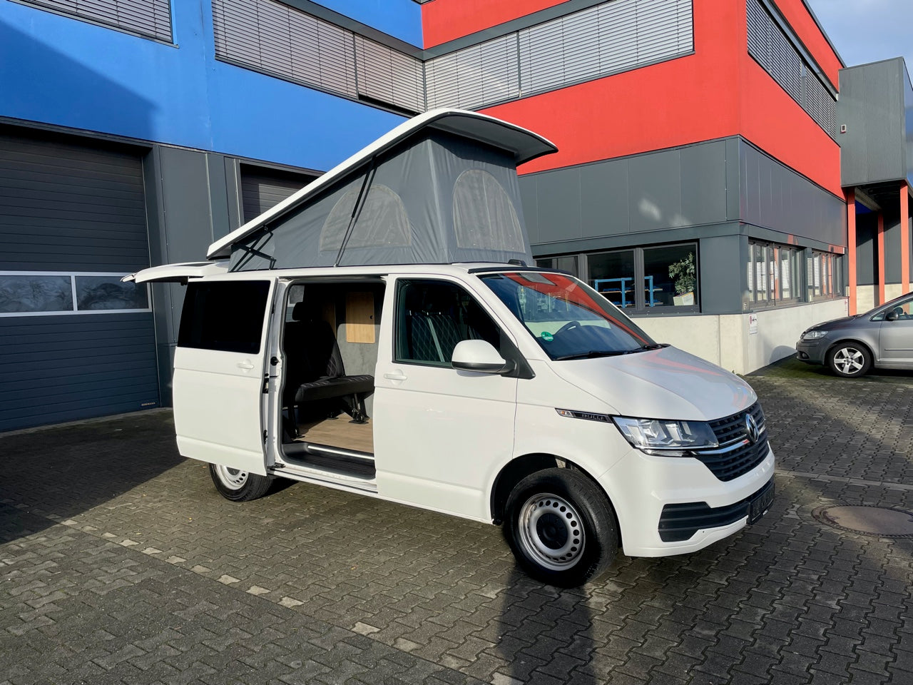 Volkswagen T6.1 Camper 2.0 TDI 150PS unfallfrei | Wohnmobil mit Hubdach Schlafdach, PDC, Navi, Rückfahrkamera