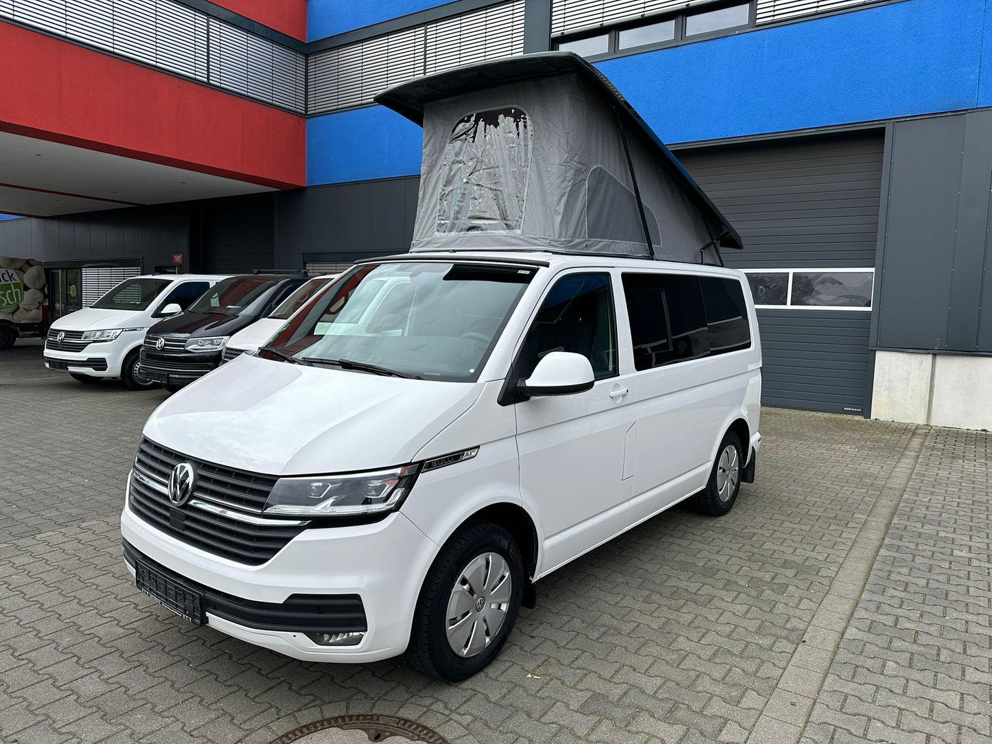 Volkswagen T6.1 Camper 2.0 TDI 150PS unfallfrei | Wohnmobil mit Hubdach Schlafdach, PDC, Navi, Rückfahrkamera | Campervan Umbau 5 Sitzer