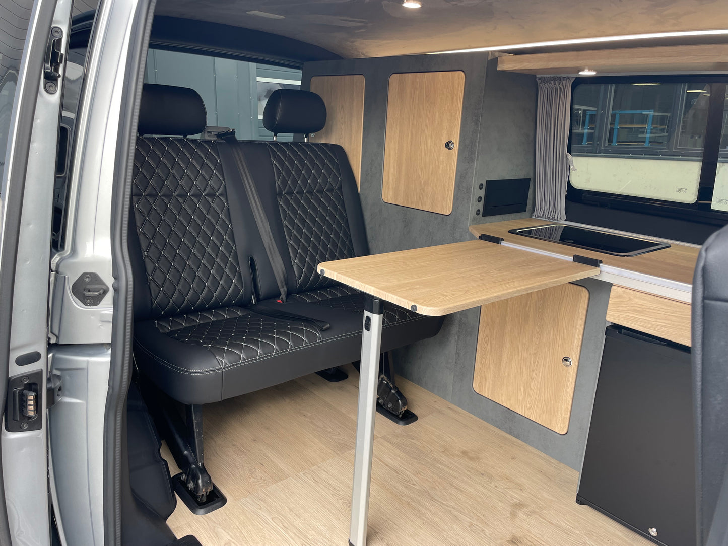 Volkswagen T6.1 Camper 2.0 TDI 110PS unfallfrei | nur 55.000km | Wohnmobil mit Navi, PDC, Rückfahrkamera | Campervan Umbau 5 Sitzer Leder