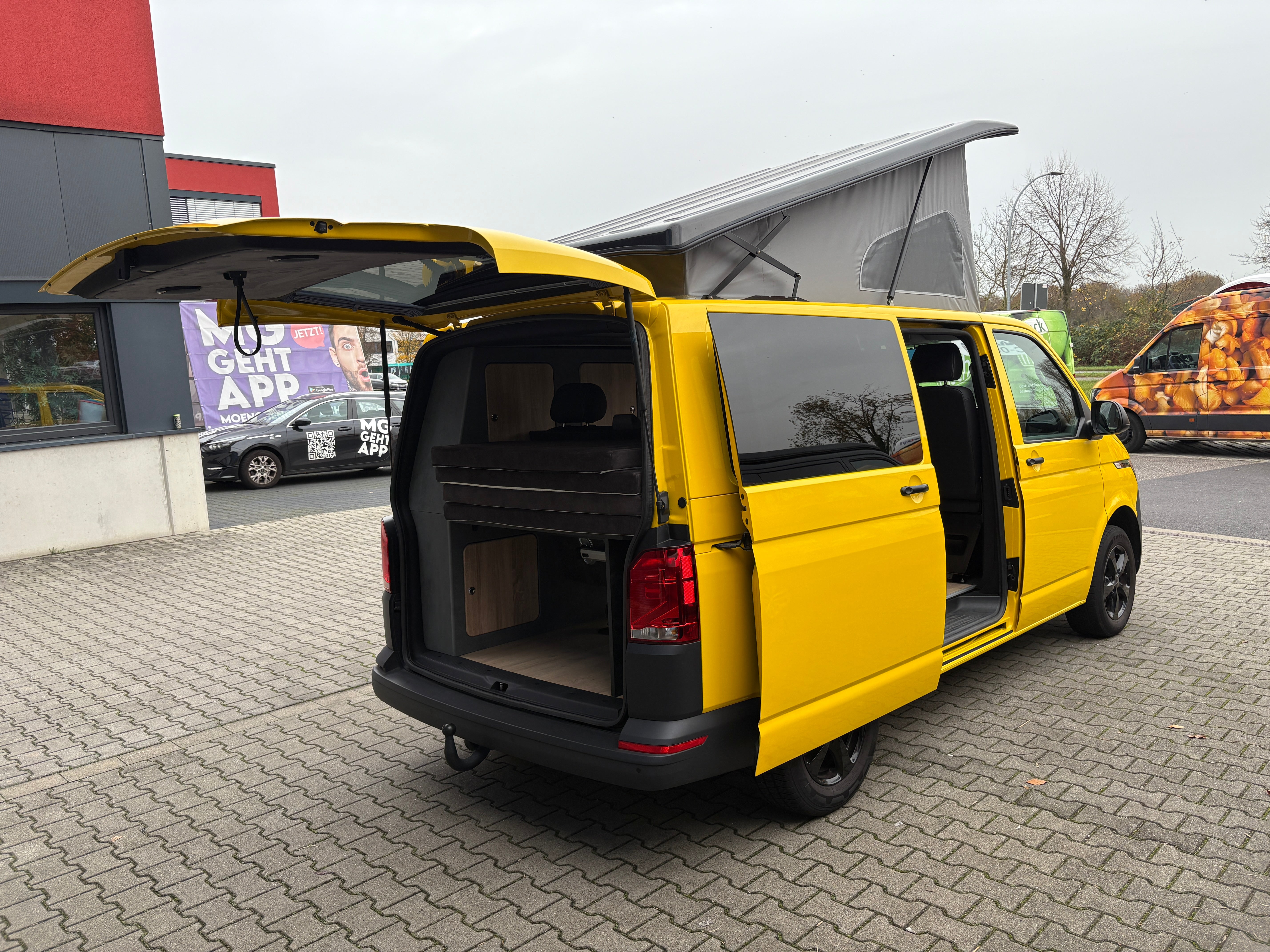 Volkswagen T6.1 Camper 2.0 TDI 110PS unfallfrei | Wohnmobil mit Hubdach Schlafdach, PDC, Anhängerkupplung, Rückfahrkamera | Campervan Umbau 5 Sitzer VW