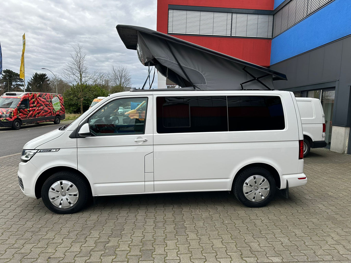 Volkswagen T6.1 Camper 2.0 TDI 150PS unfallfrei | Wohnmobil mit Hubdach Schlafdach, PDC, Navi, Rückfahrkamera | Campervan Umbau 5 Sitzer