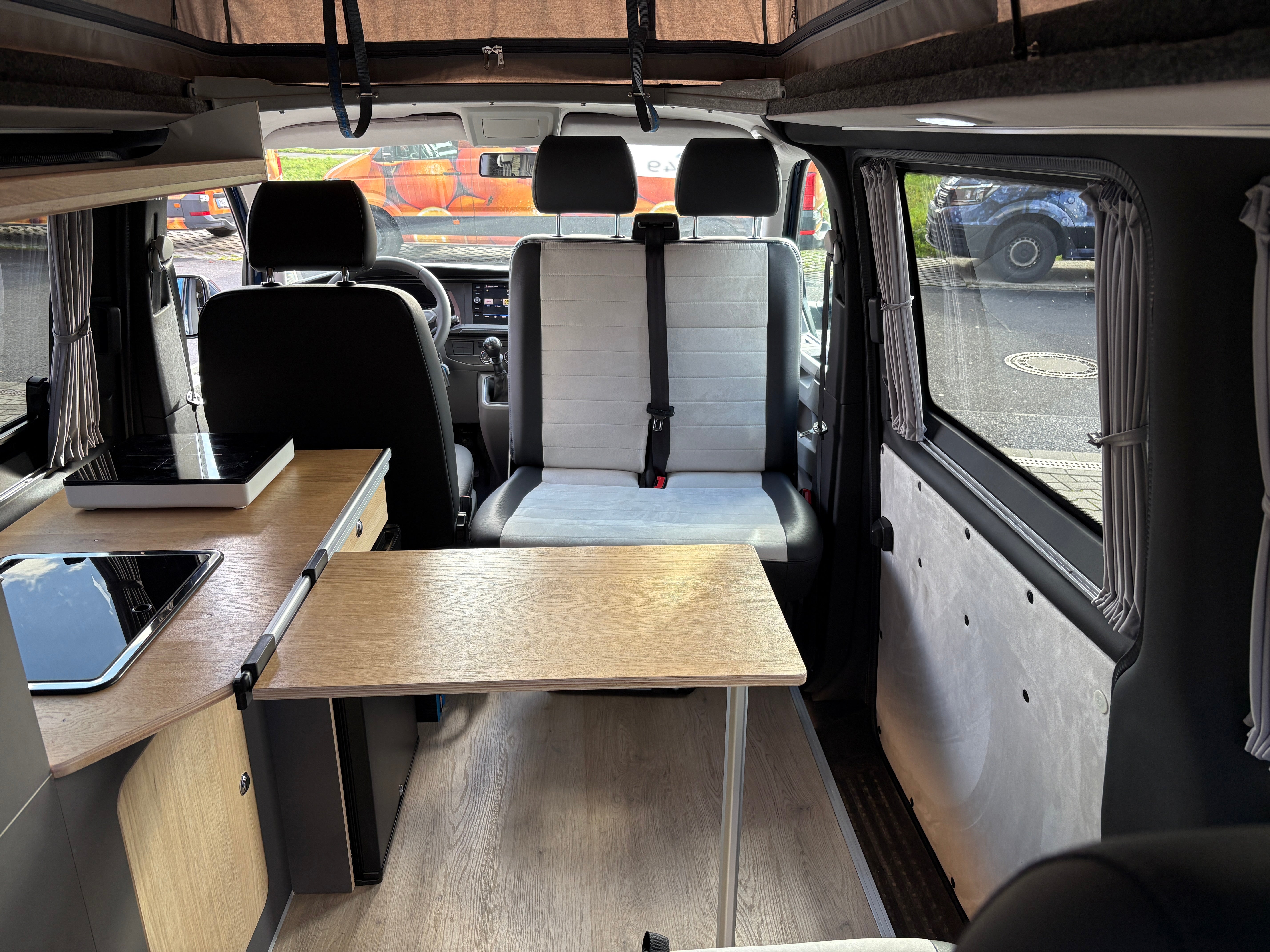 Volkswagen T6.1 Camper 2.0 TDI 110PS unfallfrei | Wohnmobil mit Hubdach Schlafdach, PDC, Navi, Rückfahrkamera | Campervan Umbau 5 Sitzer