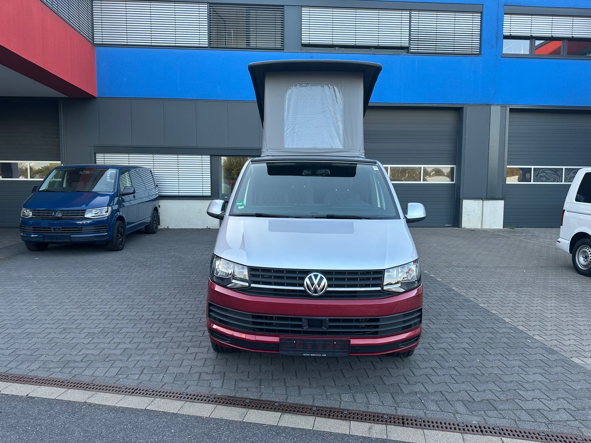 Volkswagen T6 Camper 2.0 TDI 102PS unfallfrei | Wohnmobil mit Hubdach Schlafdach, PDC, Navi, Rückfahrkamera | Campervan Umbau 5 Sitzer | VW