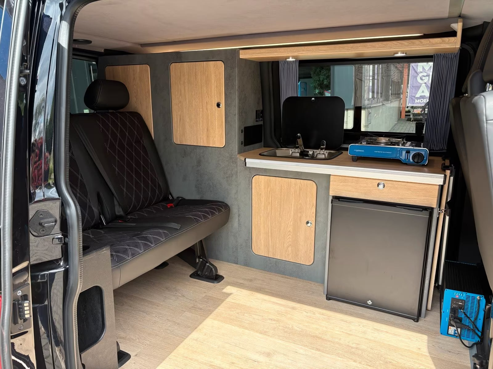 Volkswagen T6.1 Camper 2.0 TDI DSG 150PS unfallfrei | Wohnmobil mit Hubdach Schlafdach, PDC, Navi, Rückfahrkamera | Campervan Umbau 5 Sitzer VW