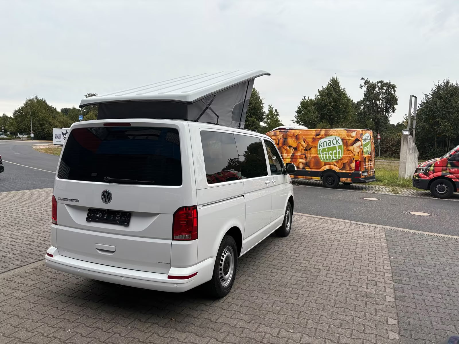 Volkswagen T6.1 Camper 2.0 TDI 150PS unfallfrei | Wohnmobil mit Hubdach Schlafdach, PDC, Rückfahrkamera | Campervan Umbau 5 Sitzer | VW