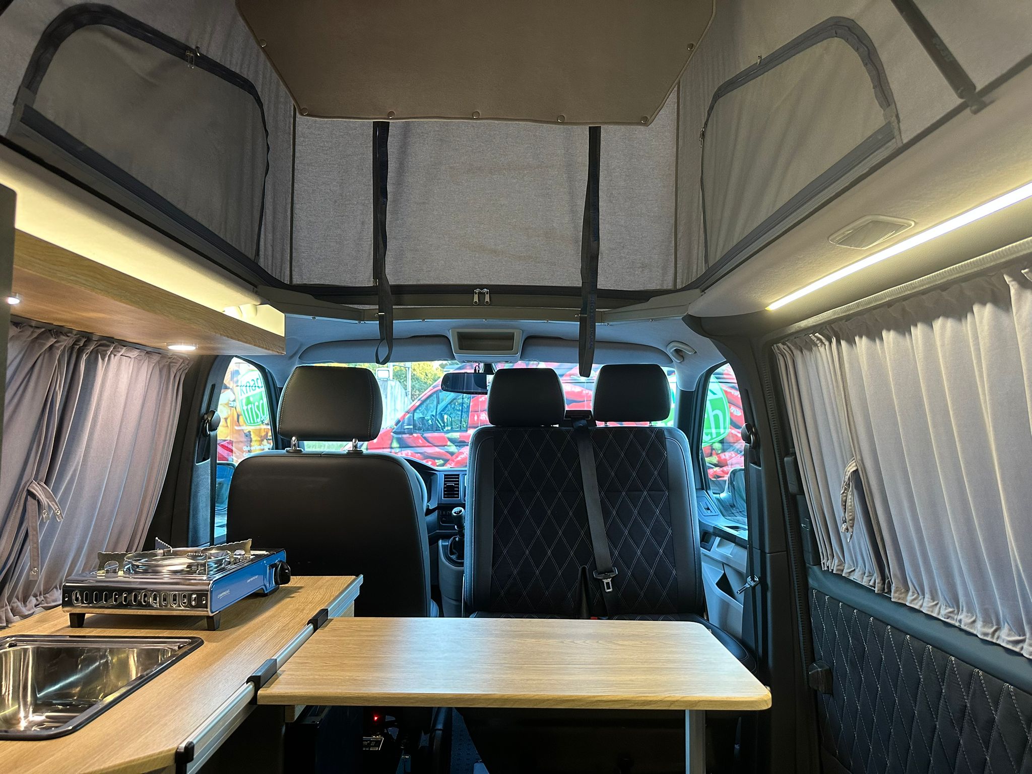 Volkswagen T6 Camper 2.0 TDI 102PS unfallfrei | Wohnmobil mit Hubdach Schlafdach, PDC, Navi, Rückfahrkamera | Campervan Umbau 5 Sitzer | VW