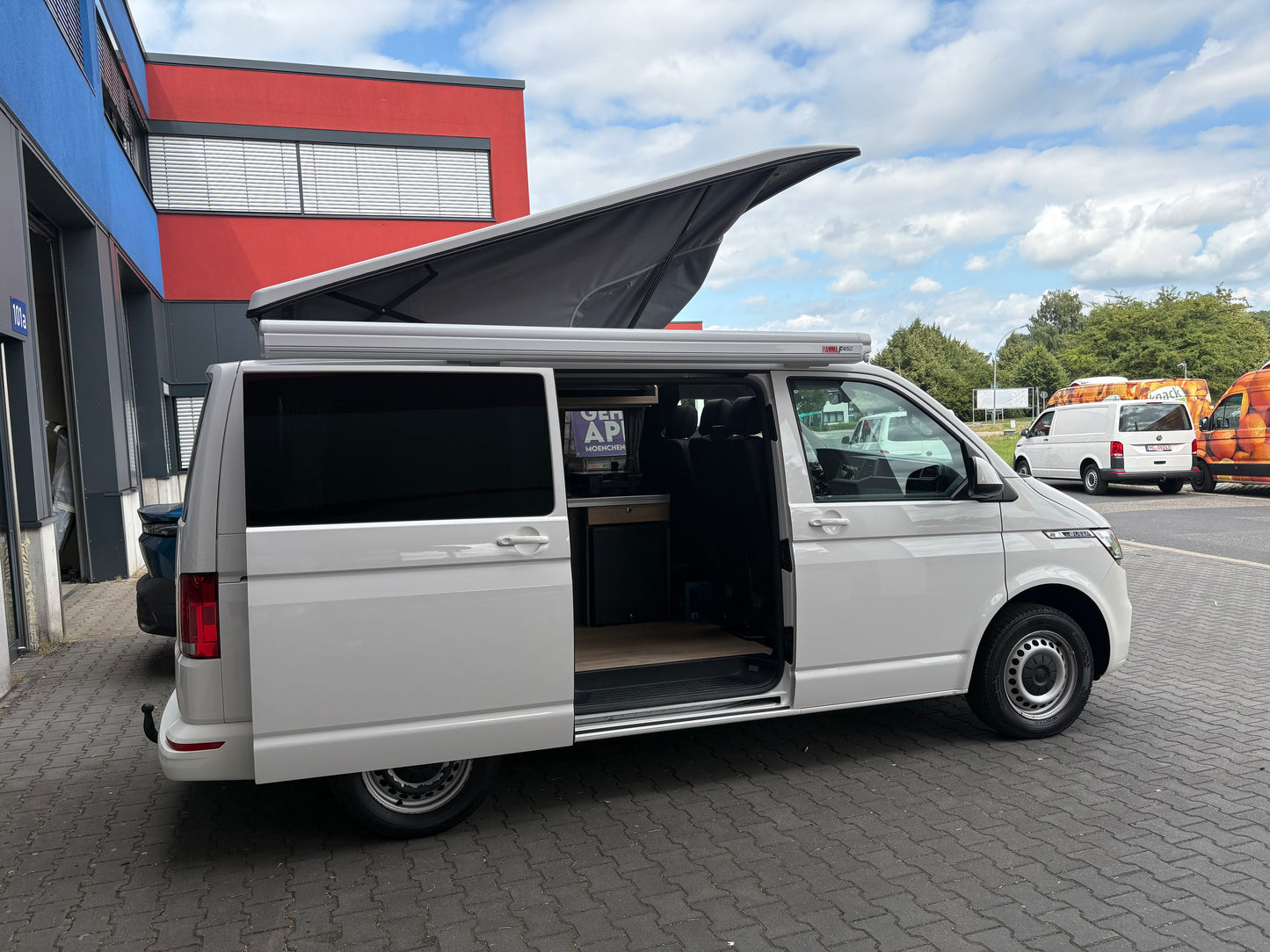 Volkswagen T6.1 Camper 2.0 TDI 150PS unfallfrei| mit Markise | Wohnmobil mit Hubdach Schlafdach, PDC, Navi, Rückfahrkamera | Campervan Umbau 5 Sitzer