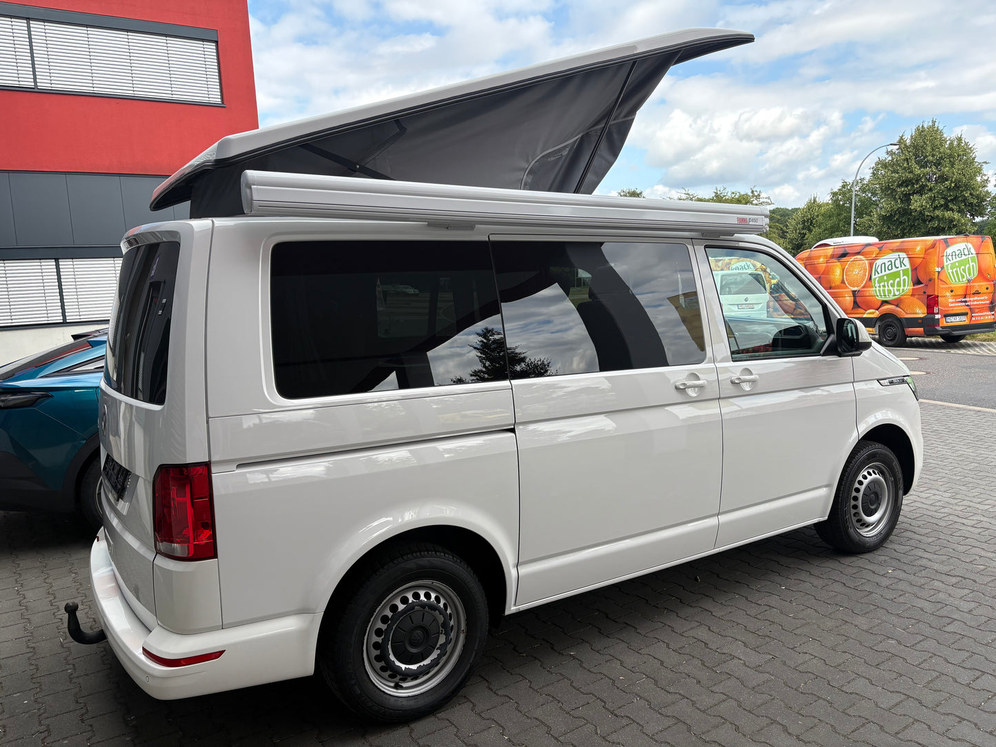 Volkswagen T6.1 Camper 2.0 TDI 150PS unfallfrei| mit Markise | Wohnmobil mit Hubdach Schlafdach, PDC, Navi, Rückfahrkamera | Campervan Umbau 5 Sitzer