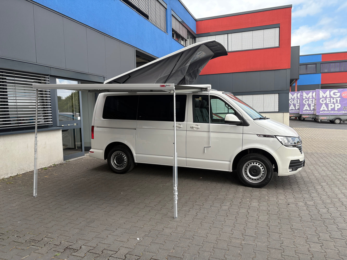 Volkswagen T6.1 Camper 2.0 TDI 150PS unfallfrei| mit Markise | Wohnmobil mit Hubdach Schlafdach, PDC, Navi, Rückfahrkamera | Campervan Umbau 5 Sitzer