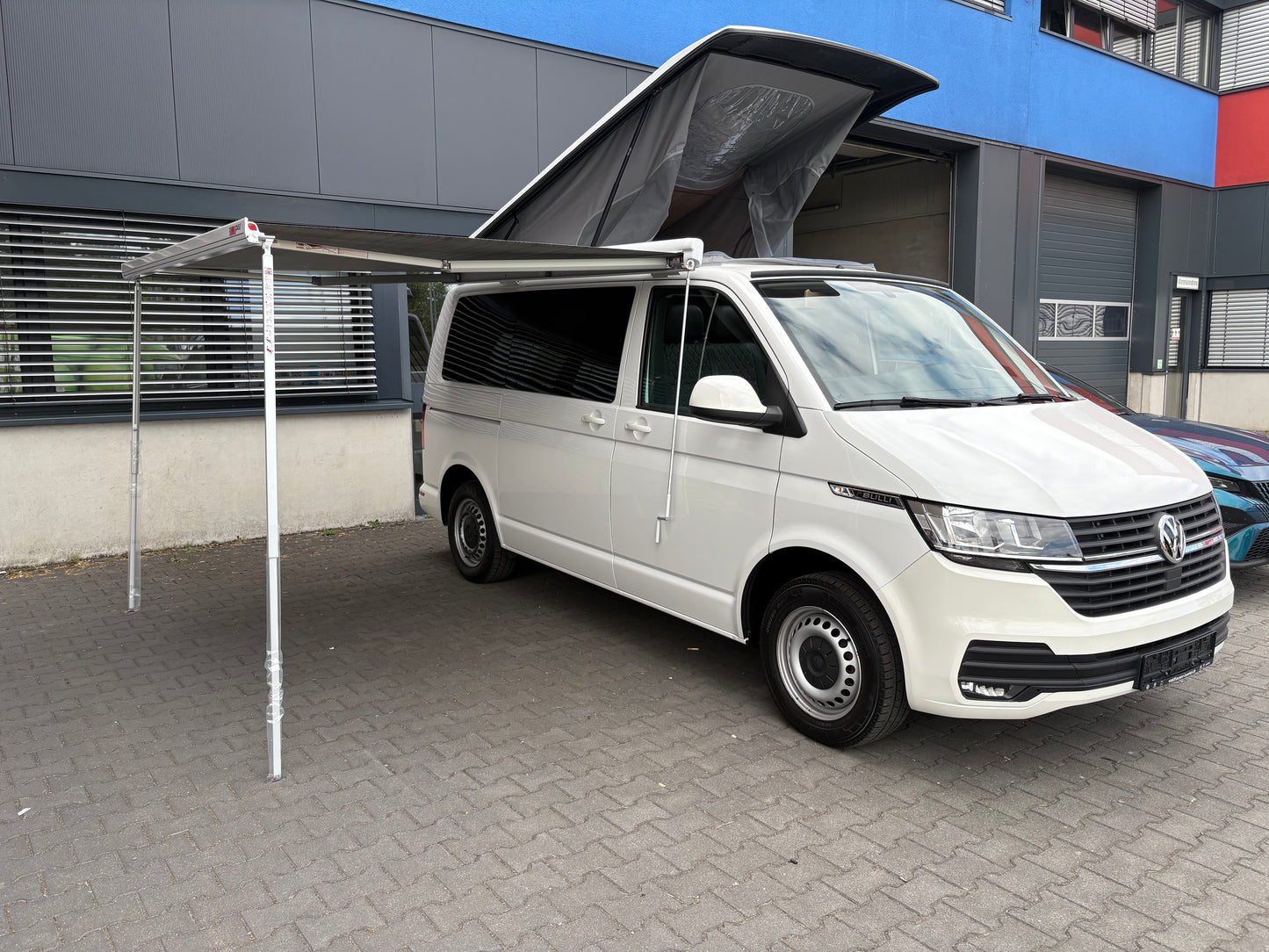 Volkswagen T6.1 Camper 2.0 TDI 150PS unfallfrei| mit Markise | Wohnmobil mit Hubdach Schlafdach, PDC, Navi, Rückfahrkamera | Campervan Umbau 5 Sitzer