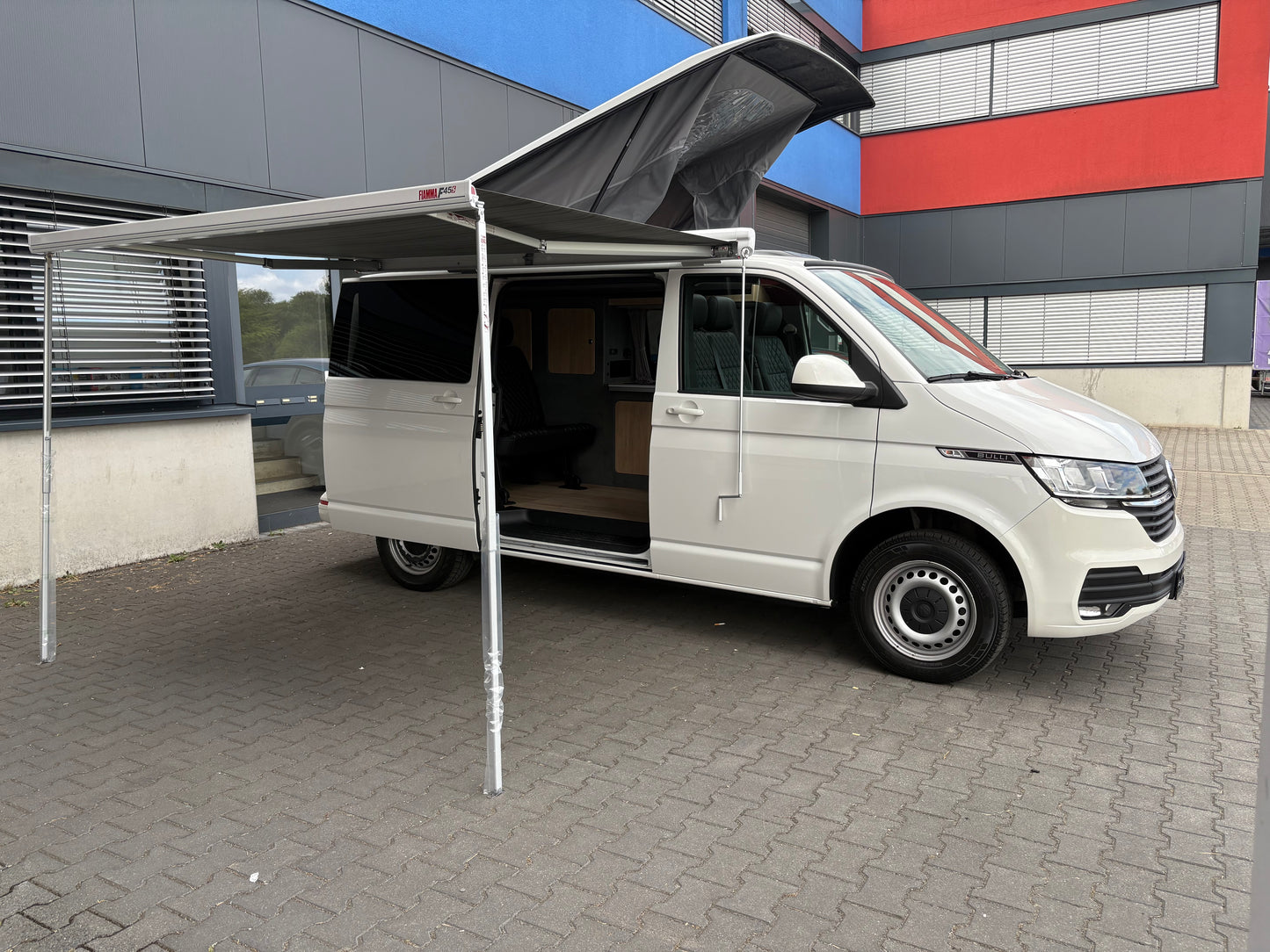 Volkswagen T6.1 Camper 2.0 TDI 150PS unfallfrei| mit Markise | Wohnmobil mit Hubdach Schlafdach, PDC, Navi, Rückfahrkamera | Campervan Umbau 5 Sitzer