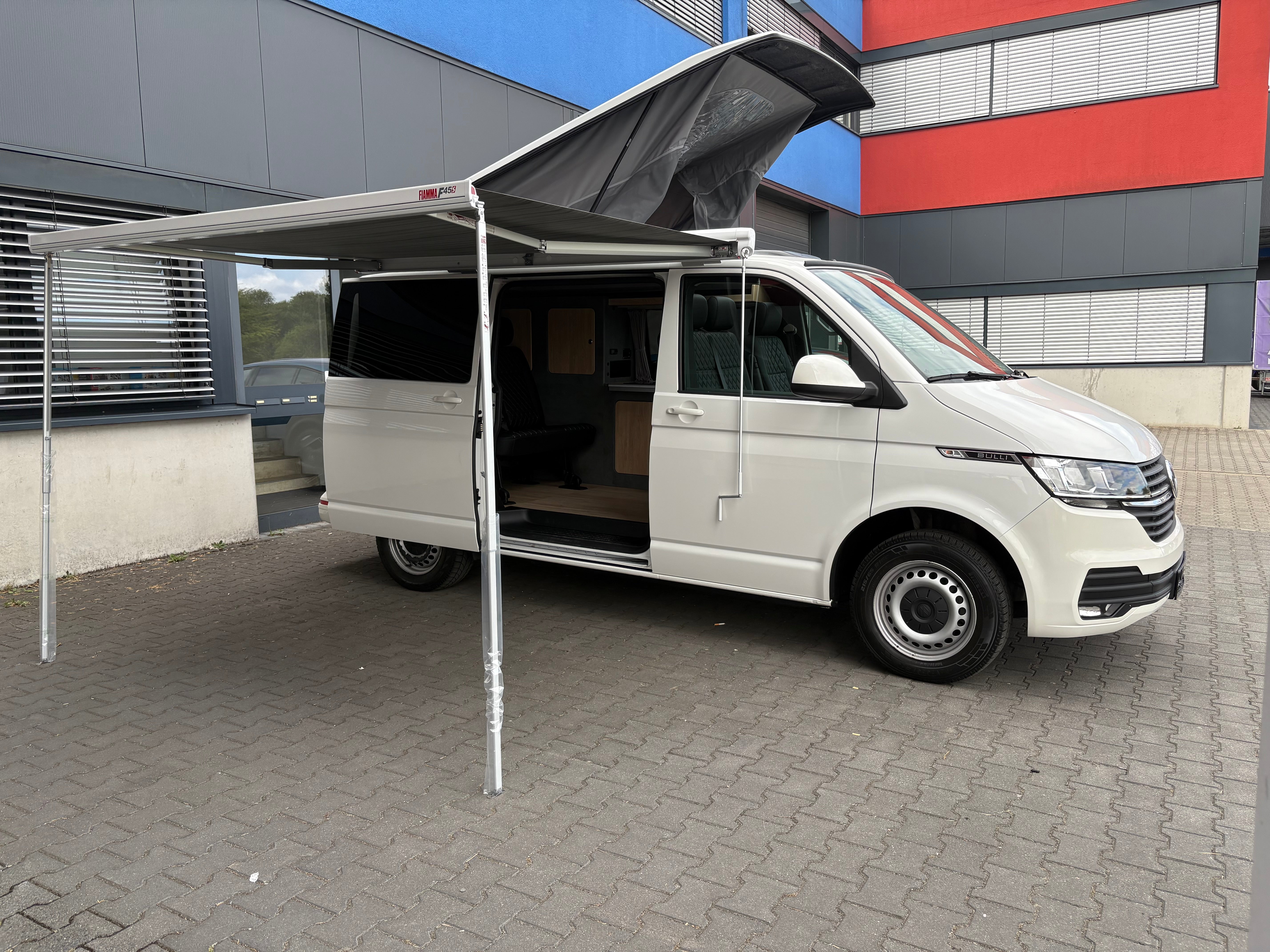 Volkswagen T6.1 Camper 2.0 TDI 150PS unfallfrei| mit Markise | Wohnmobil mit Hubdach Schlafdach, PDC, Navi, Rückfahrkamera | Campervan Umbau 5 Sitzer
