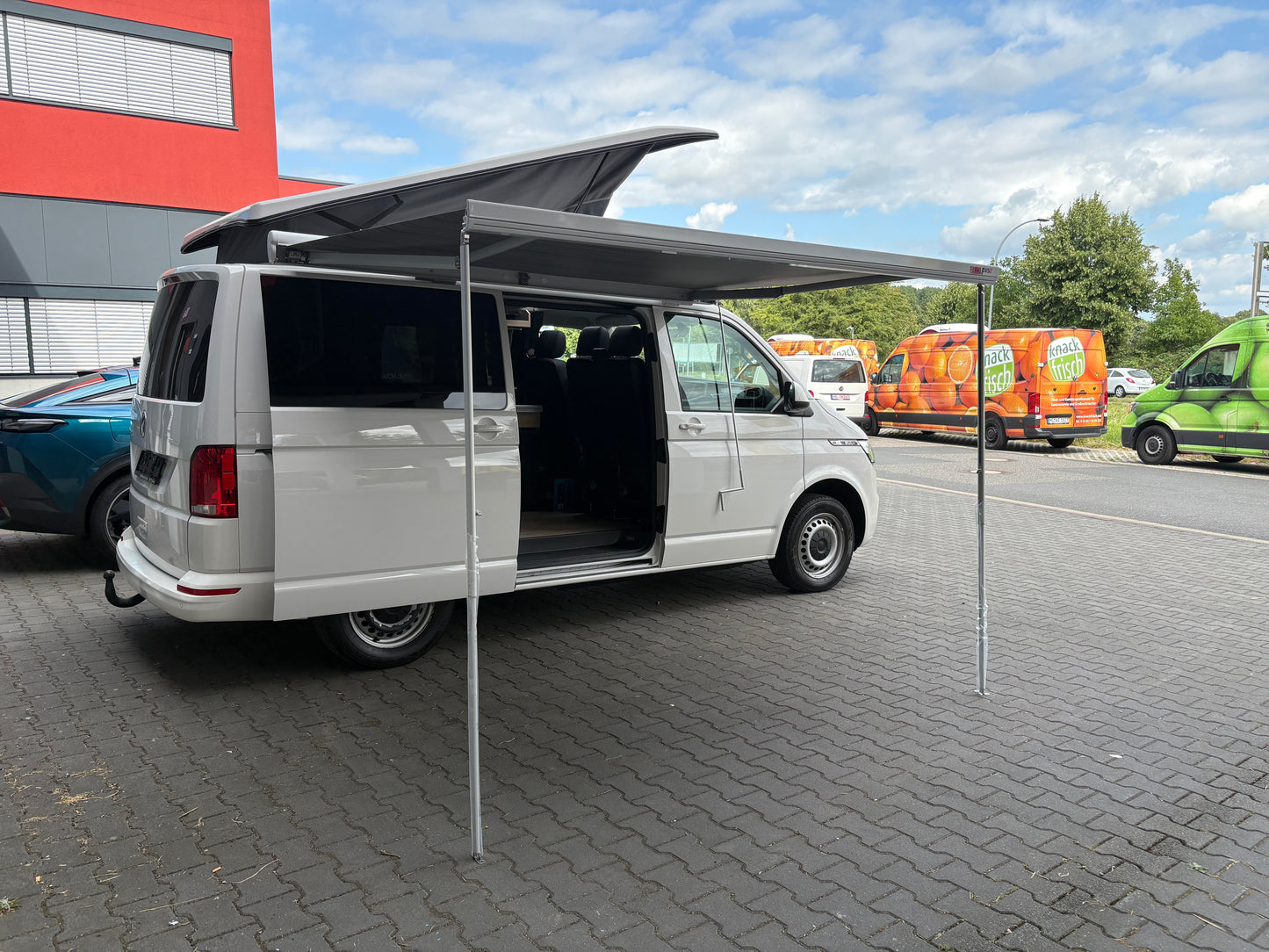 Volkswagen T6.1 Camper 2.0 TDI 150PS unfallfrei| mit Markise | Wohnmobil mit Hubdach Schlafdach, PDC, Navi, Rückfahrkamera | Campervan Umbau 5 Sitzer