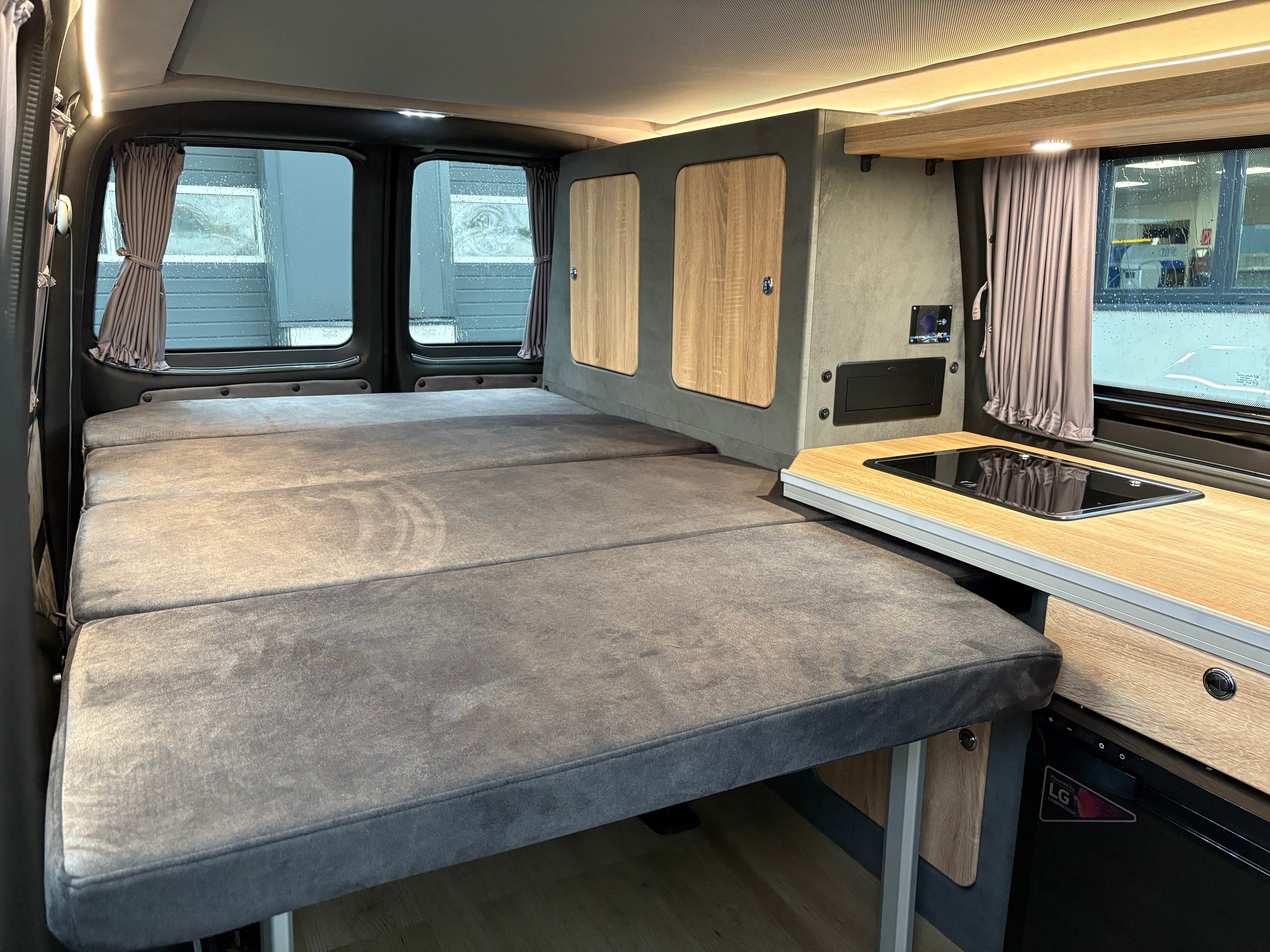 Volkswagen T6.1 Camper mit Schlafdach 2.0 TDI, 150 PS, Gelb, DSG | VW Bulli Wohmobil Campervan | KM-Stand: 81.000 km, EZ: 02.2020, Foto 8 | Weit & Wald Mönchengladbach