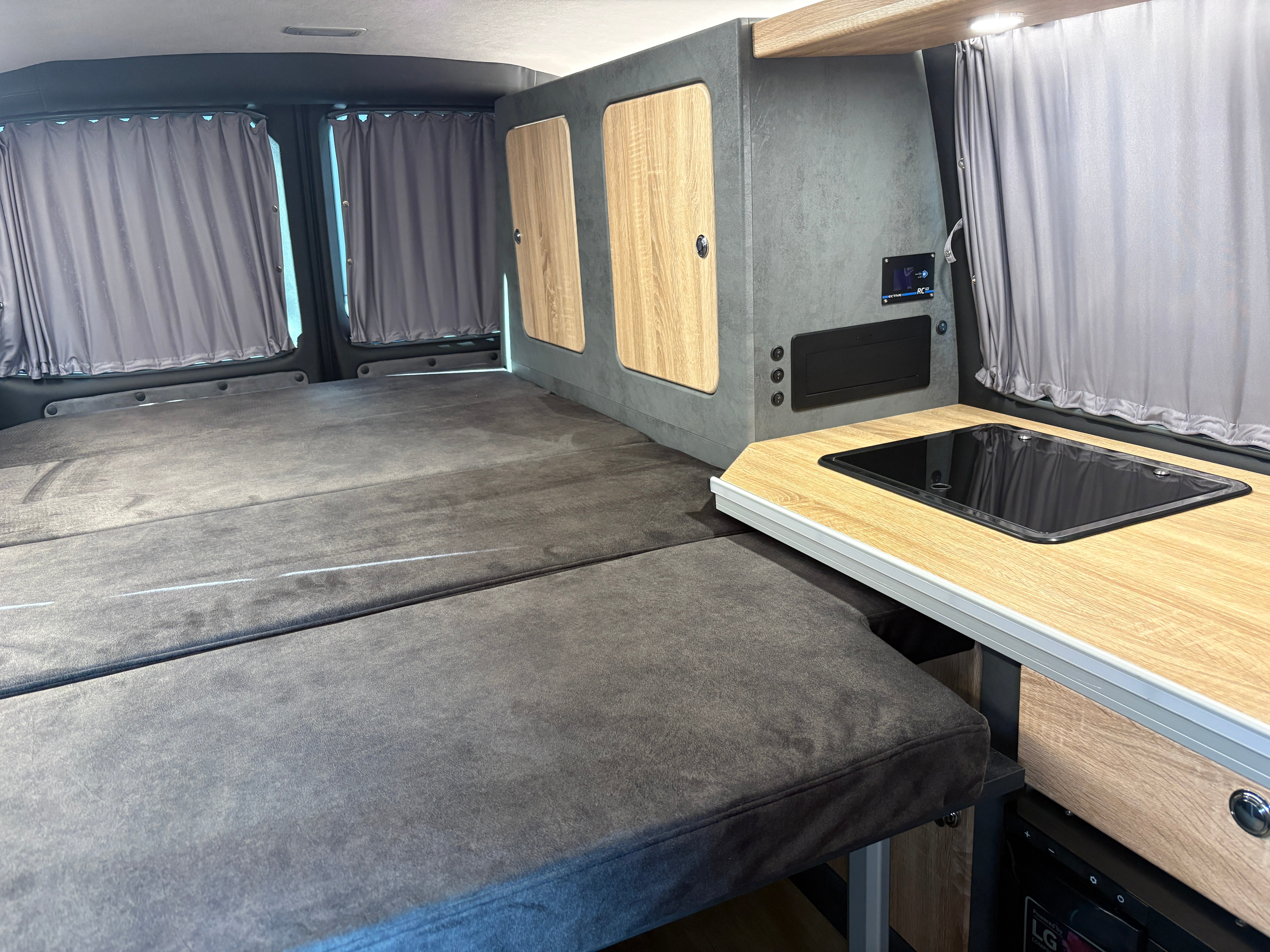 Volkswagen T6.1 Camper 2.0 TDI, 110 PS, Weiß | VW Bulli Wohmobil Campervan | KM-Stand: 143.000 km, EZ: 10.2020, Foto 11 | Weit & Wald Mönchengladbach