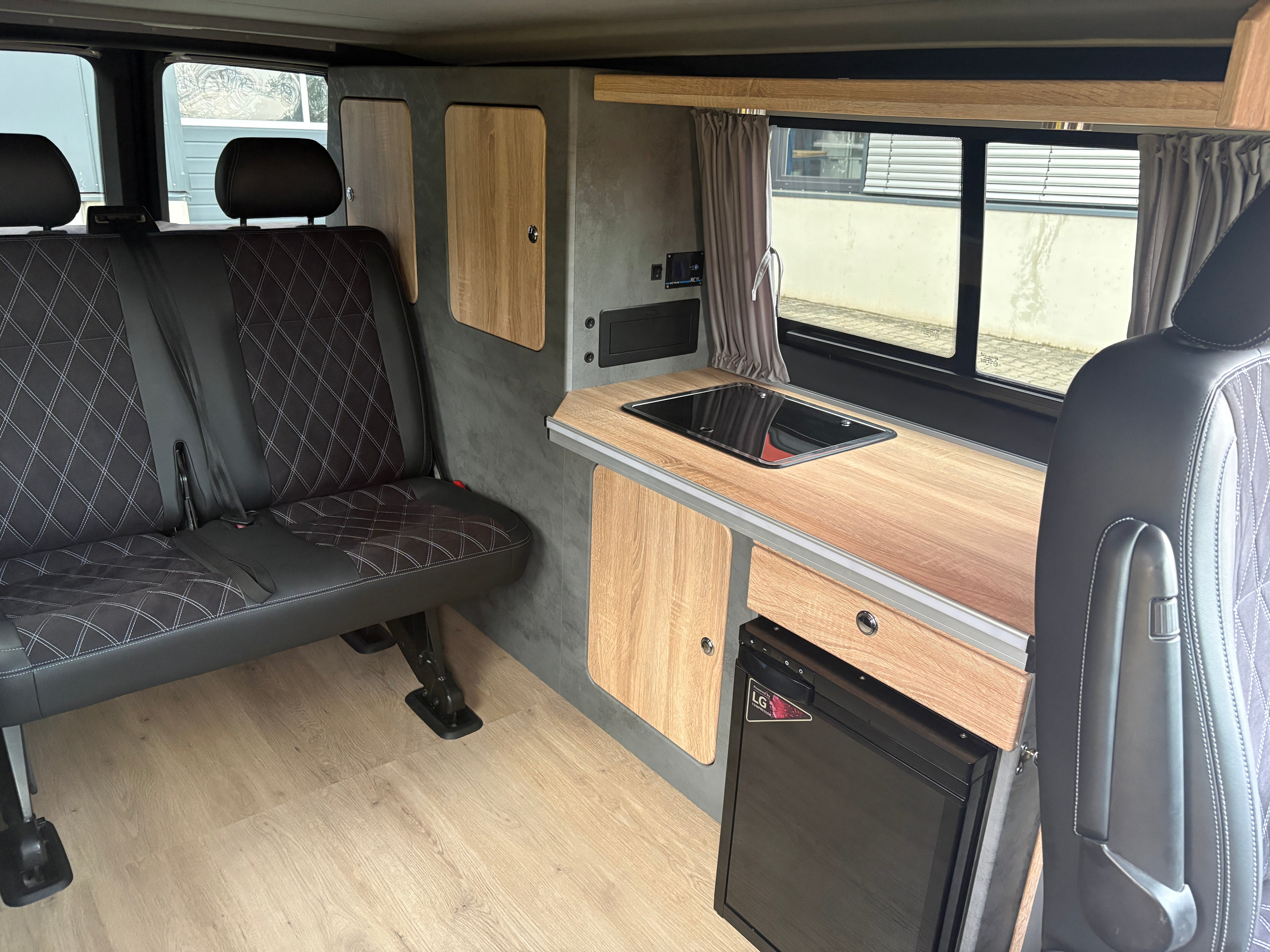 Volkswagen T6.1 Camper mit Schlafdach 2.0 TDI, 110 PS, Weiß | VW Bulli Wohmobil Campervan | KM-Stand: 80.000 km, EZ: 05.2021, Foto 14 | Weit & Wald Mönchengladbach