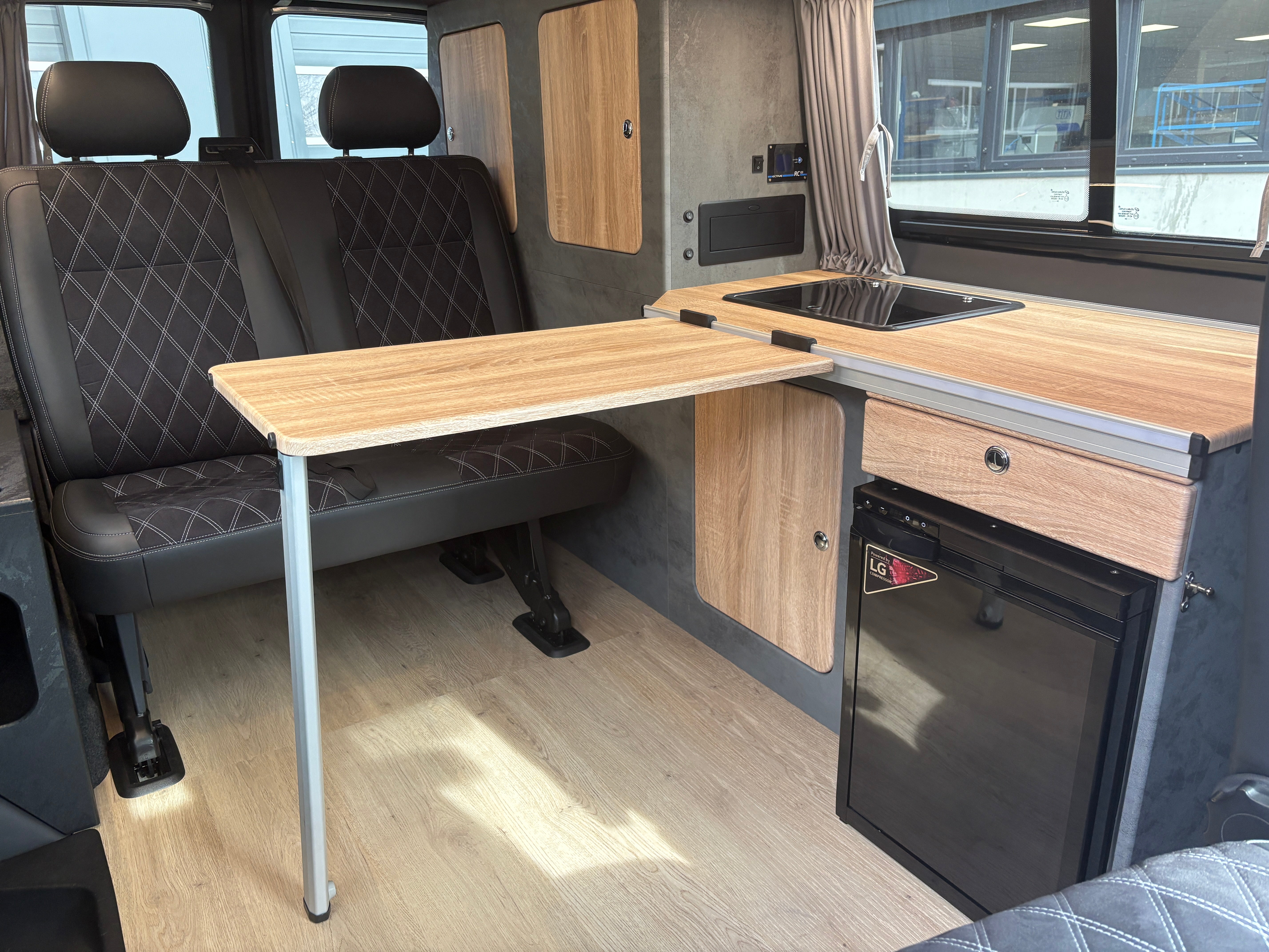 Volkswagen T6.1 Camper mit Schlafdach 2.0 TDI, 110 PS, Weiß | VW Bulli Wohmobil Campervan | KM-Stand: 80.000 km, EZ: 05.2021, Foto 15 | Weit & Wald Mönchengladbach