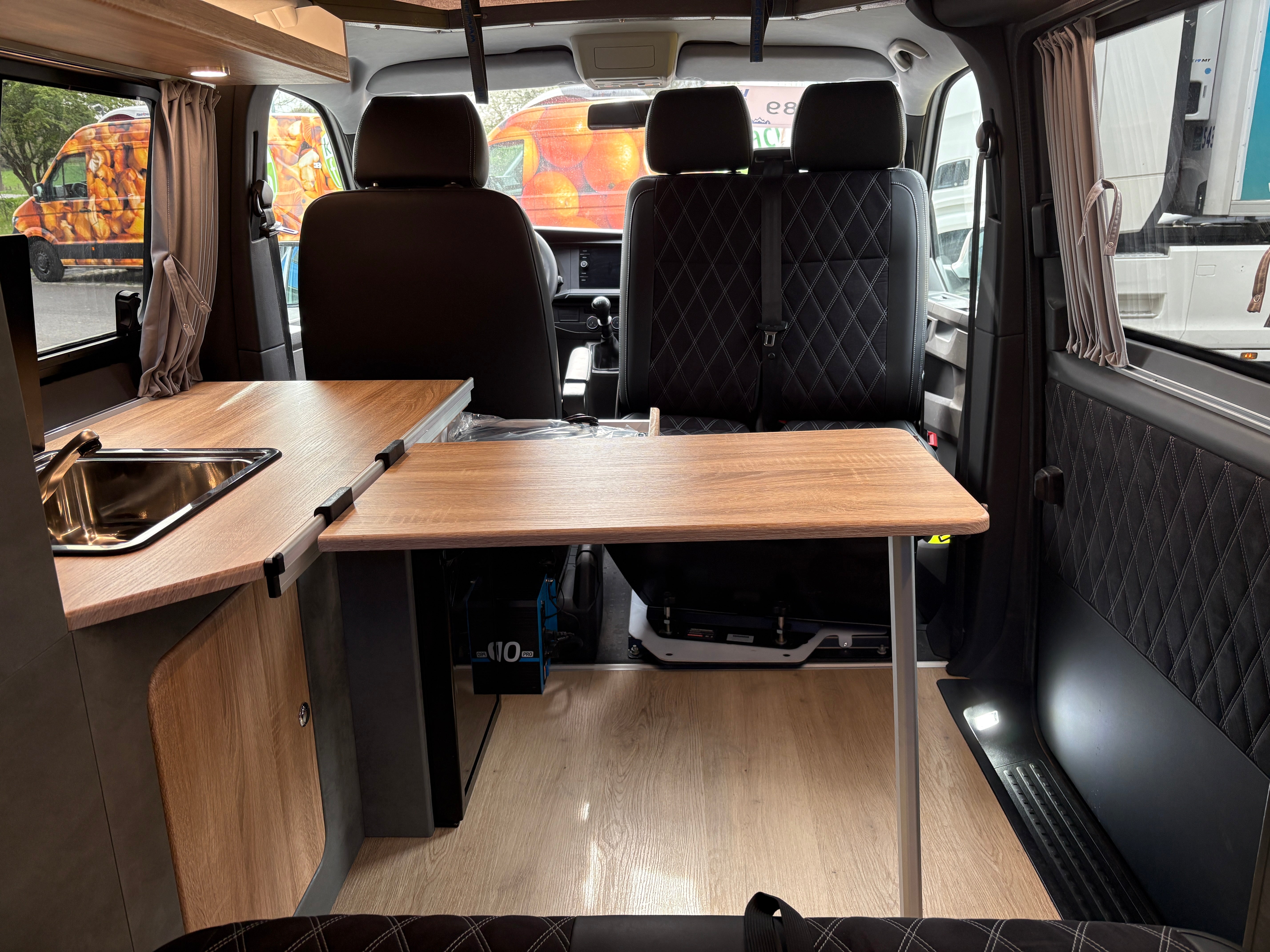 Volkswagen T6.1 Camper mit Schlafdach 2.0 TDI, 110 PS, Weiß | VW Bulli Wohmobil Campervan | KM-Stand: 80.000 km, EZ: 05.2021, Foto 20 | Weit & Wald Mönchengladbach