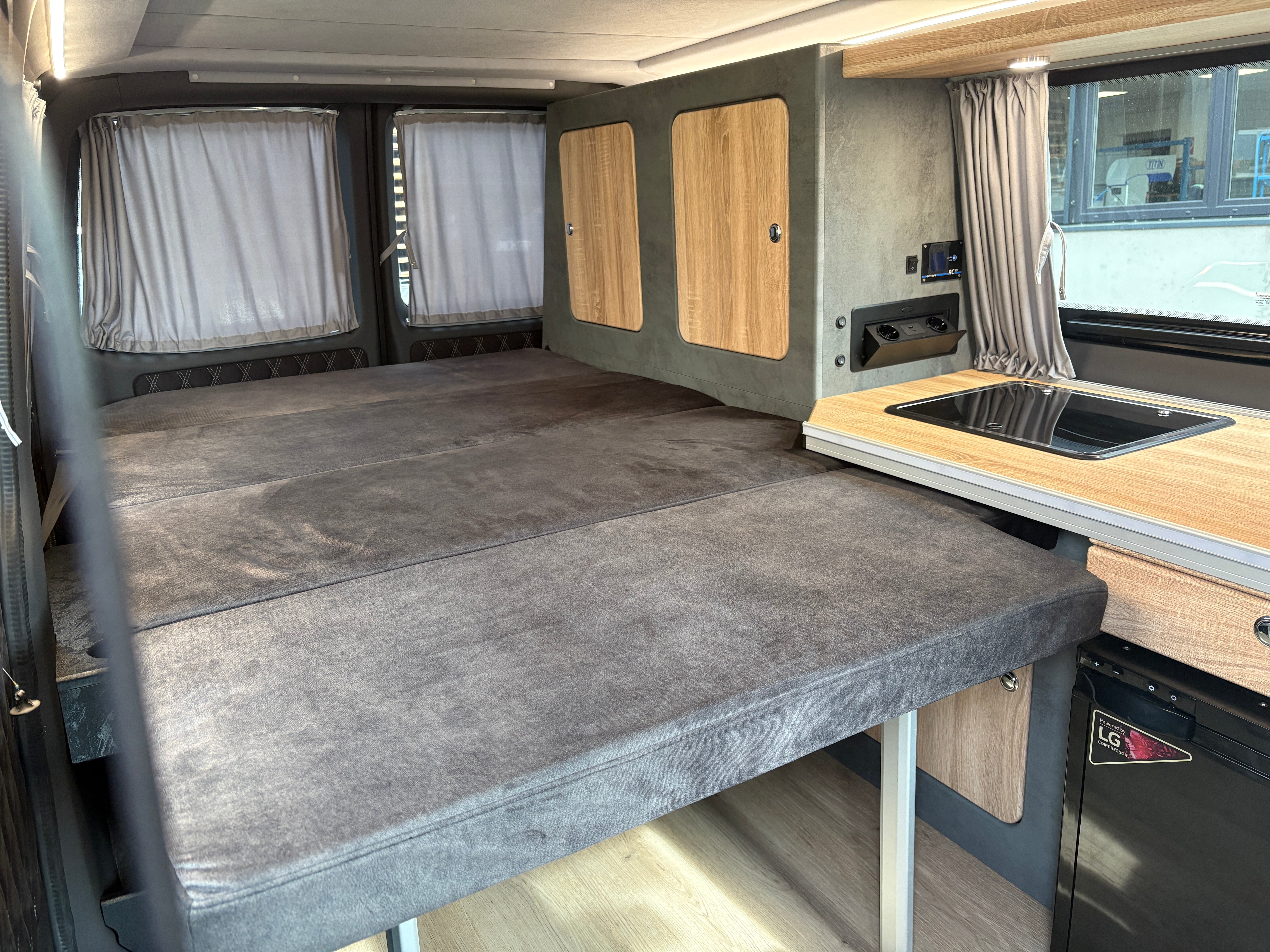 Volkswagen T6.1 Camper mit Schlafdach 2.0 TDI, 110 PS, Weiß | VW Bulli Wohmobil Campervan | KM-Stand: 80.000 km, EZ: 05.2021, Foto 25 | Weit & Wald Mönchengladbach