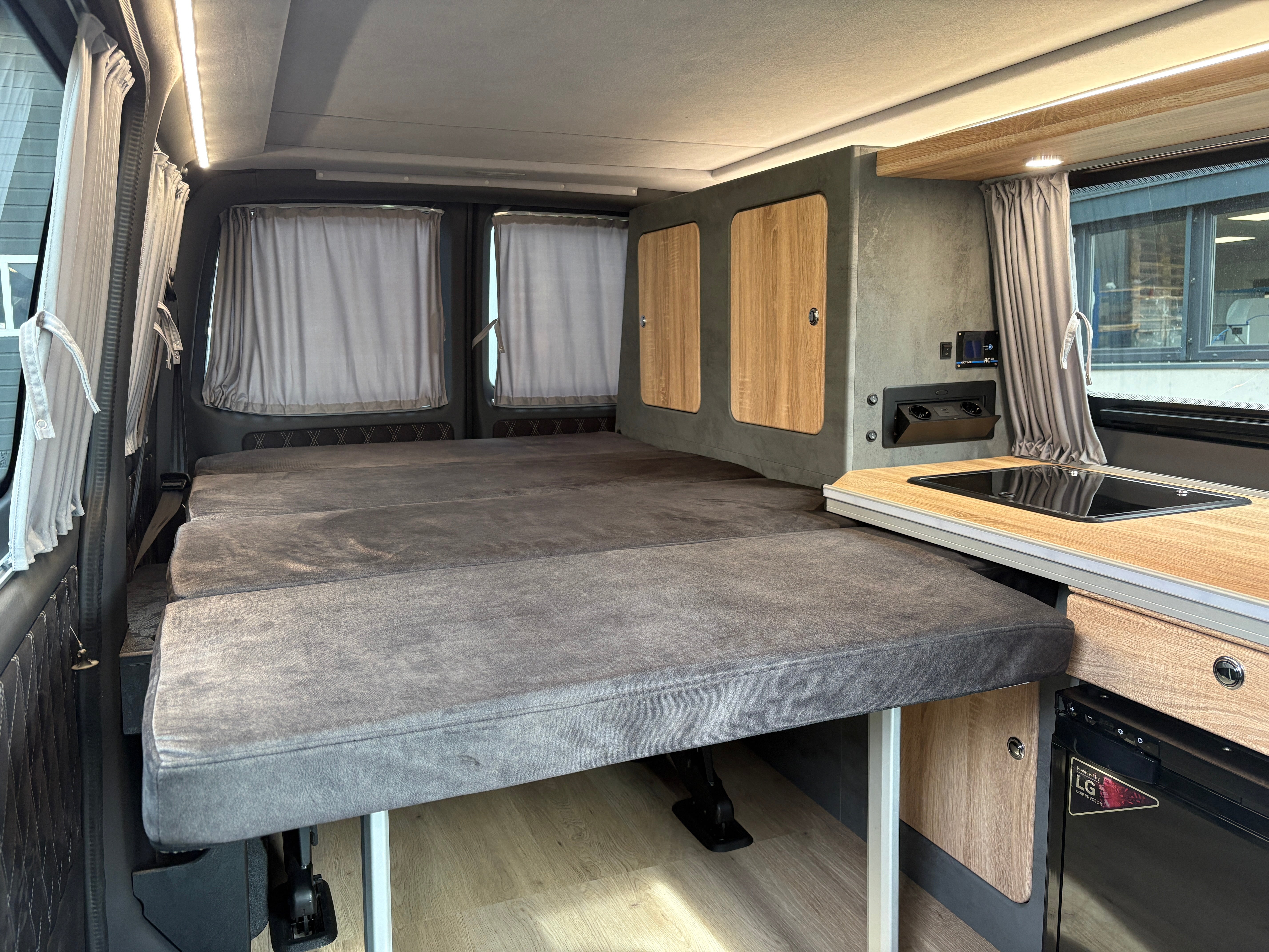 Volkswagen T6.1 Camper mit Schlafdach 2.0 TDI, 110 PS, Weiß | VW Bulli Wohmobil Campervan | KM-Stand: 80.000 km, EZ: 05.2021, Foto 26 | Weit & Wald Mönchengladbach