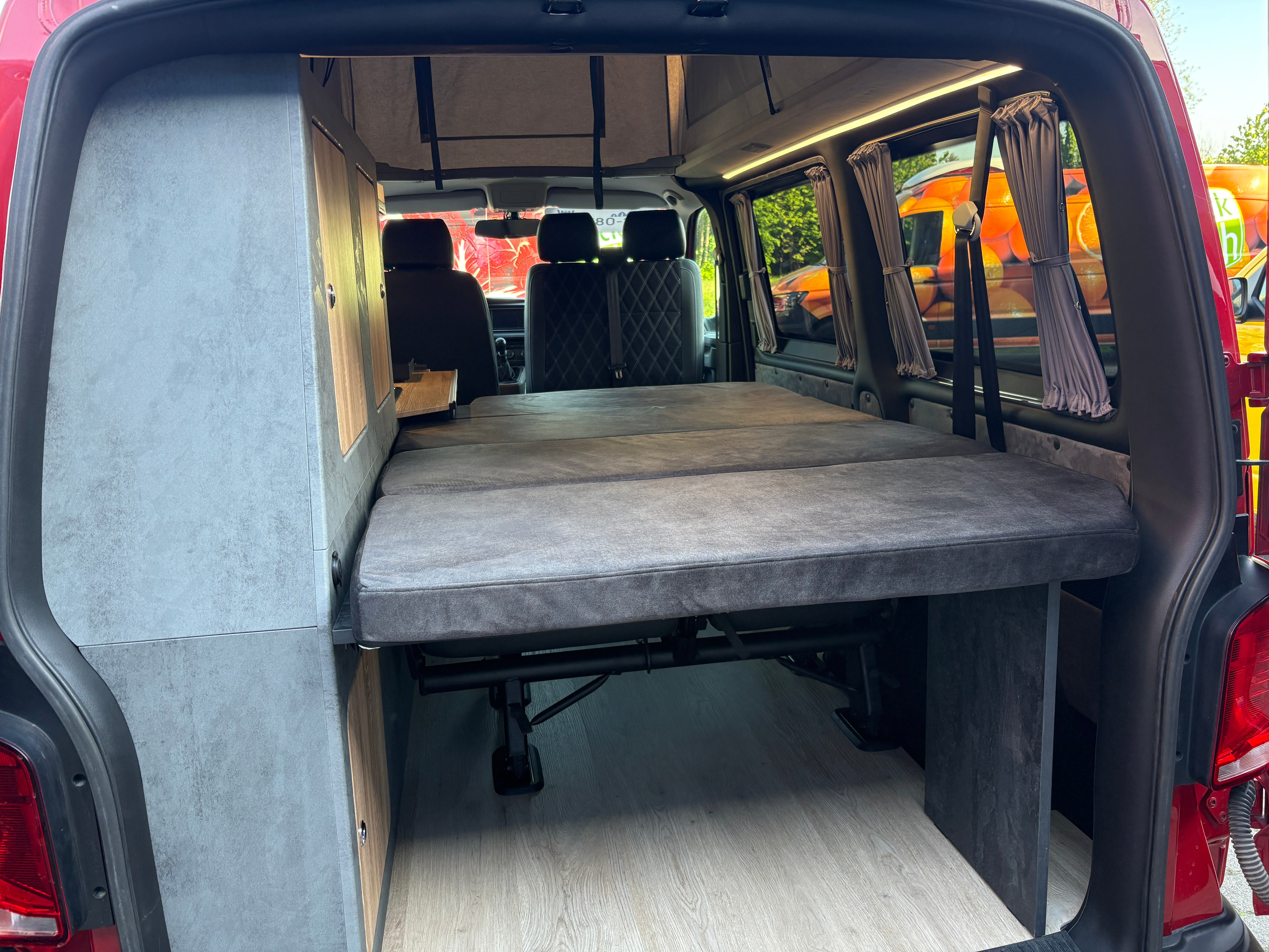 Volkswagen T6.1 Camper mit Schlafdach 2.0 TDI, 110 PS, Rot | VW Bulli Wohmobil Campervan | KM-Stand: 94.000 km, EZ: 09.2020, Foto 26 | Weit & Wald Mönchengladbach