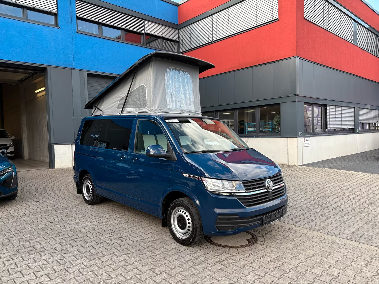 Volkswagen T6.1 Camper 2.0 TDI 110PS unfallfrei | Wohnmobil mit Hubdach Schlafdach, PDC, Navi, Rückfahrkamera | Campervan Umbau 5 Sitzer