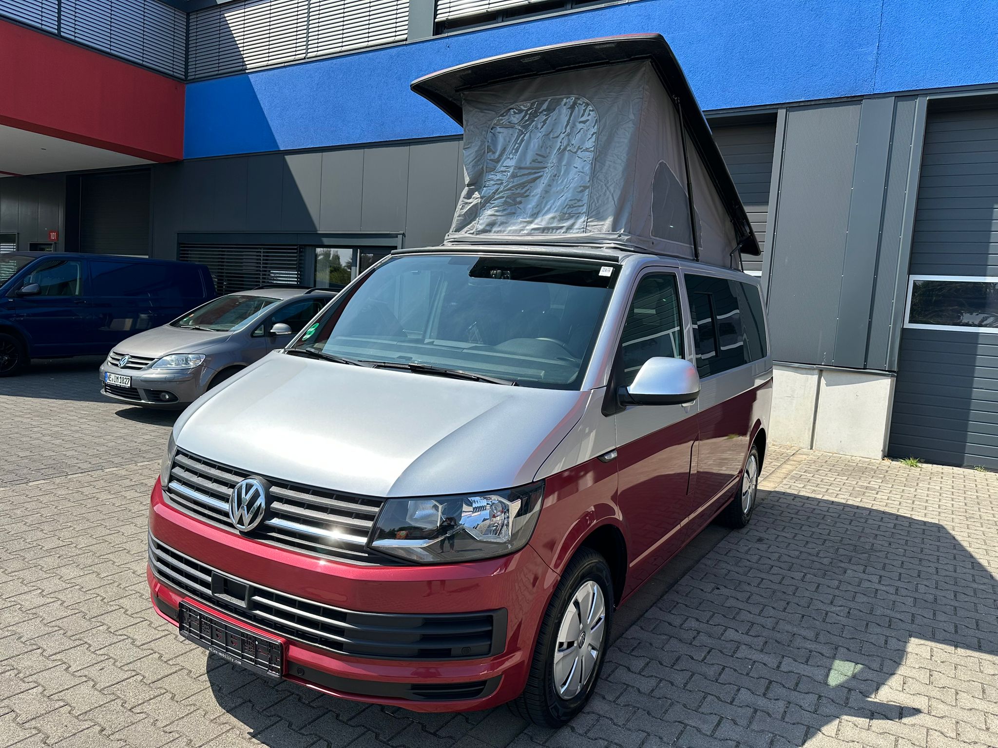 Volkswagen T6 Camper 2.0 TDI 102PS unfallfrei | Wohnmobil mit Hubdach Schlafdach, PDC, Navi, Rückfahrkamera | Campervan Umbau 5 Sitzer | VW