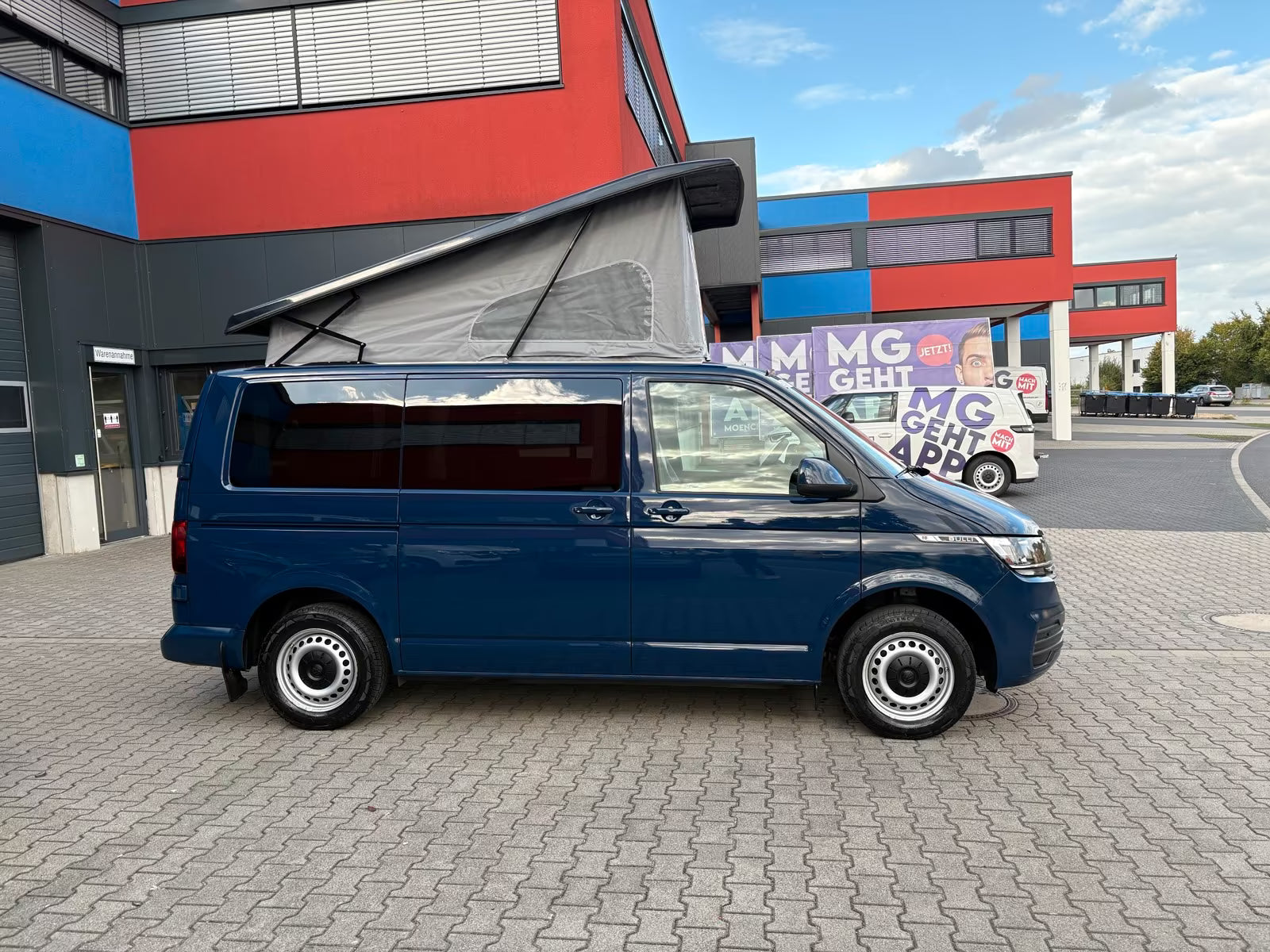 Volkswagen T6.1 Camper 2.0 TDI 110PS unfallfrei | Wohnmobil mit Hubdach Schlafdach, PDC, Navi, Rückfahrkamera | Campervan Umbau 5 Sitzer